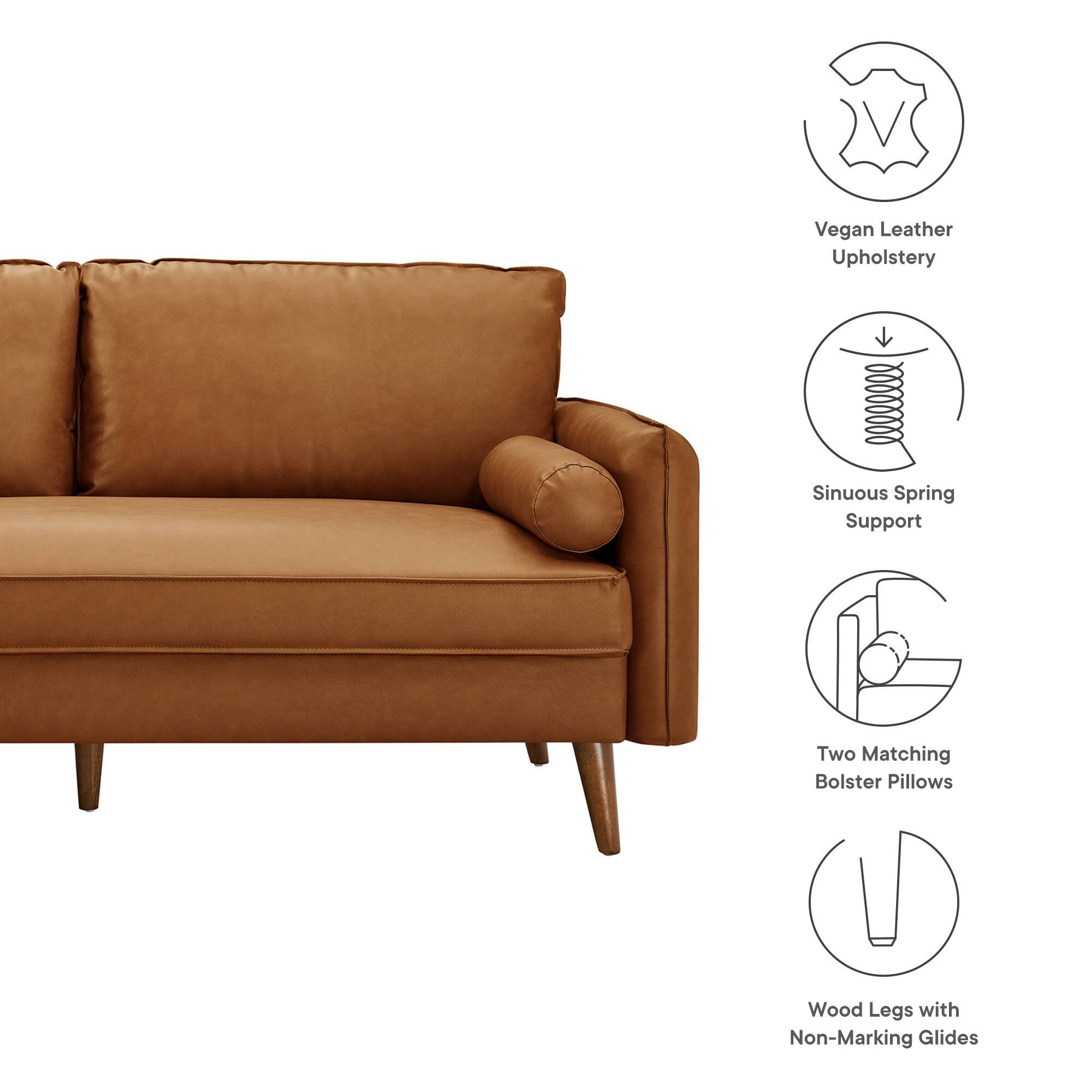 - Vegan Leather Upholstery
- Sinuous Spring Support
- Two Matching Bolster Pillows
- Wood Legs with Non-Marking Glides