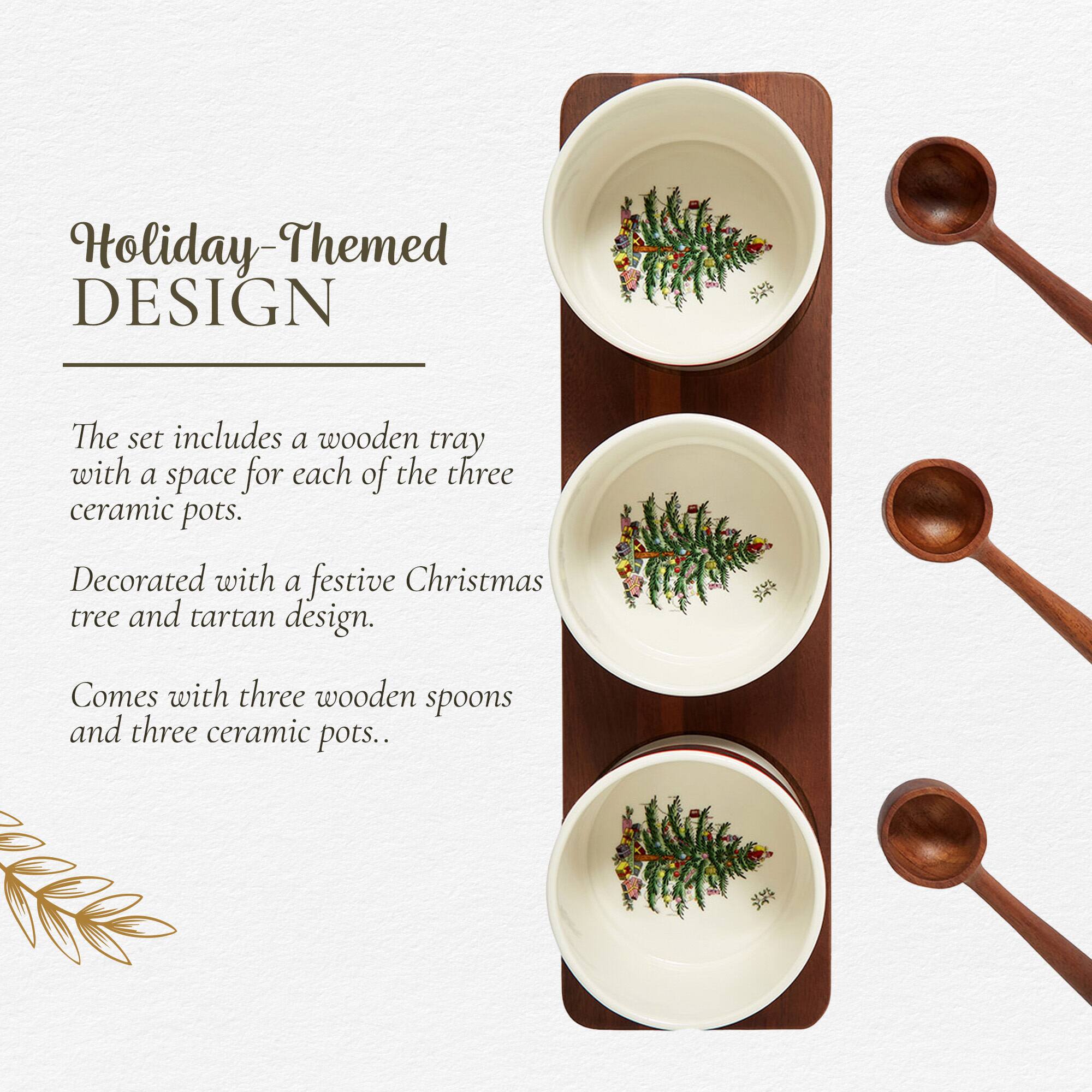 Holiday-Themed DESIGN

The set includes a wooden tray with a space for each of the three ceramic pots. Decorated with a festive Christmas tree and tartan design. Comes with three wooden spoons and three ceramic pots.