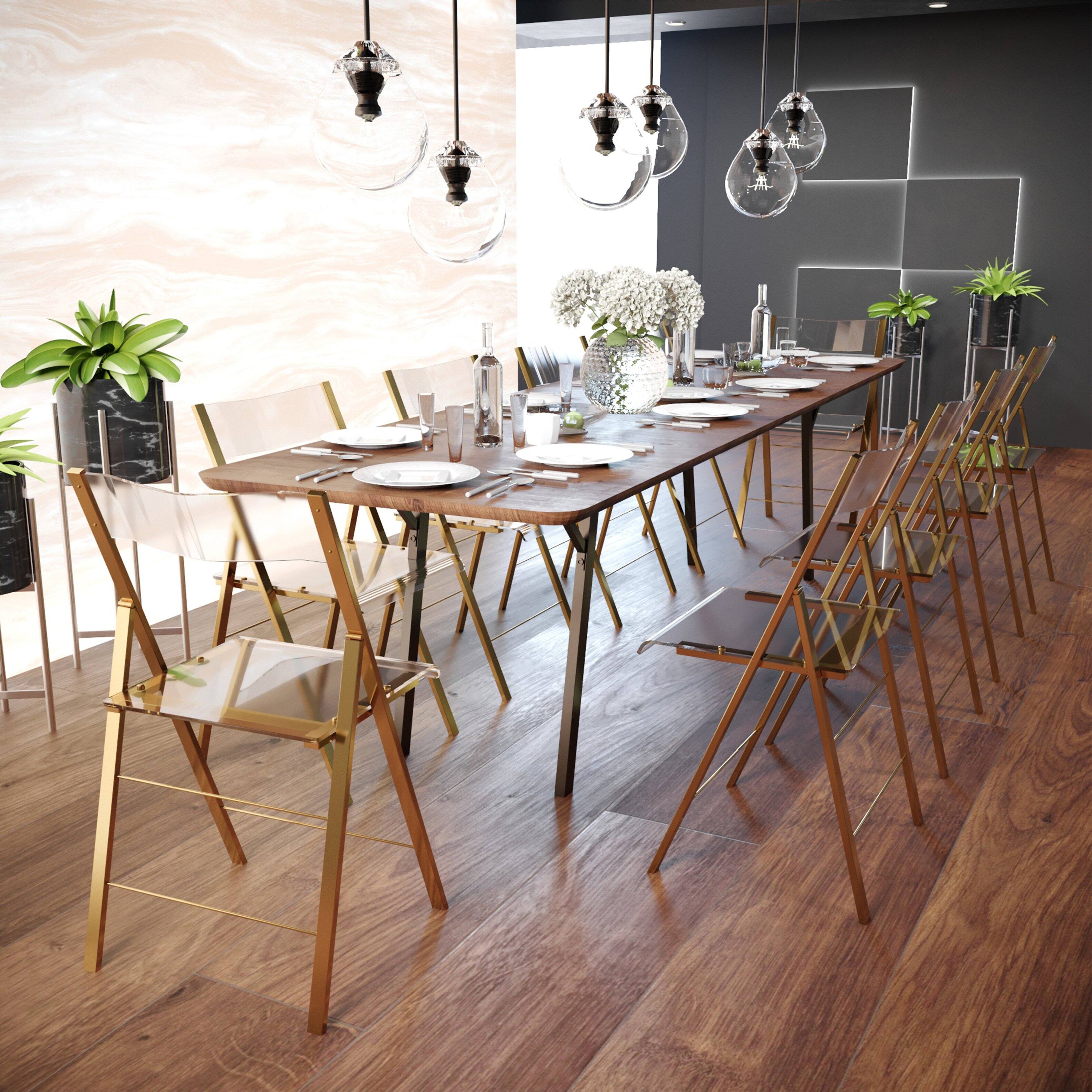 Angle. LeisureMod - Menno Foldable Clear Acrylic Dining Chair with Stainless Steel Frame & Floor Protectors - Set of 4.