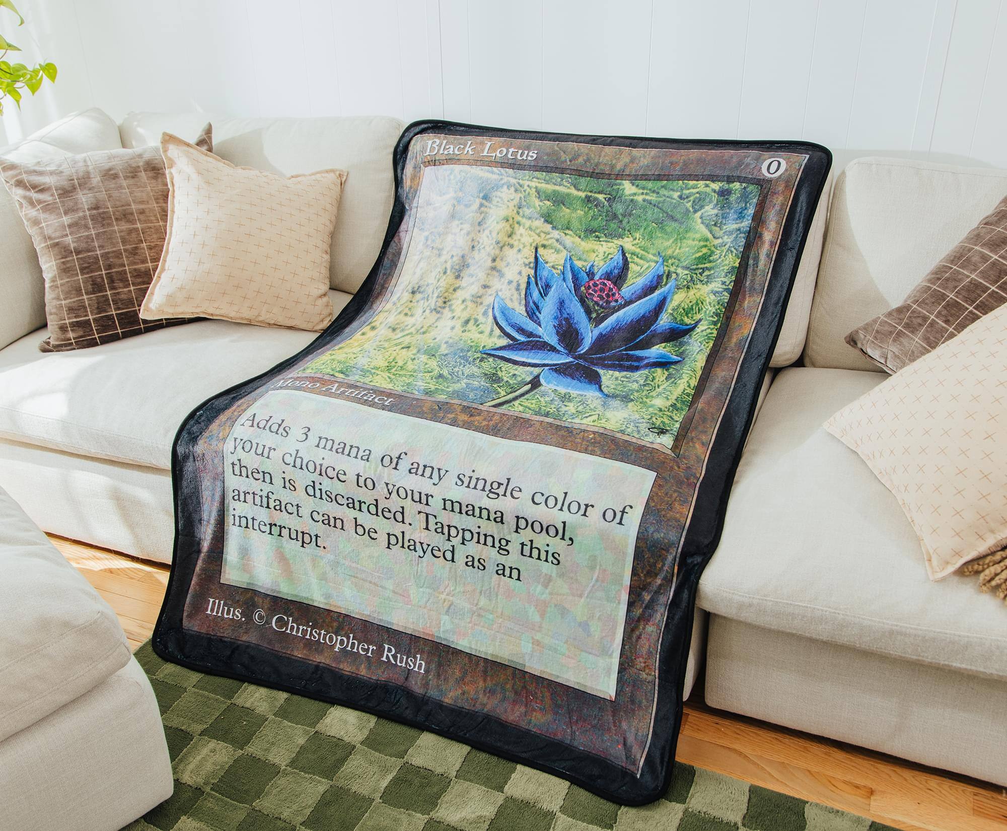 Black Lotus  
Adds 3 mana of any single color of your choice to your mana pool; tapping this artifact can be played as an interrupt.  
Illus. © Christopher Rush