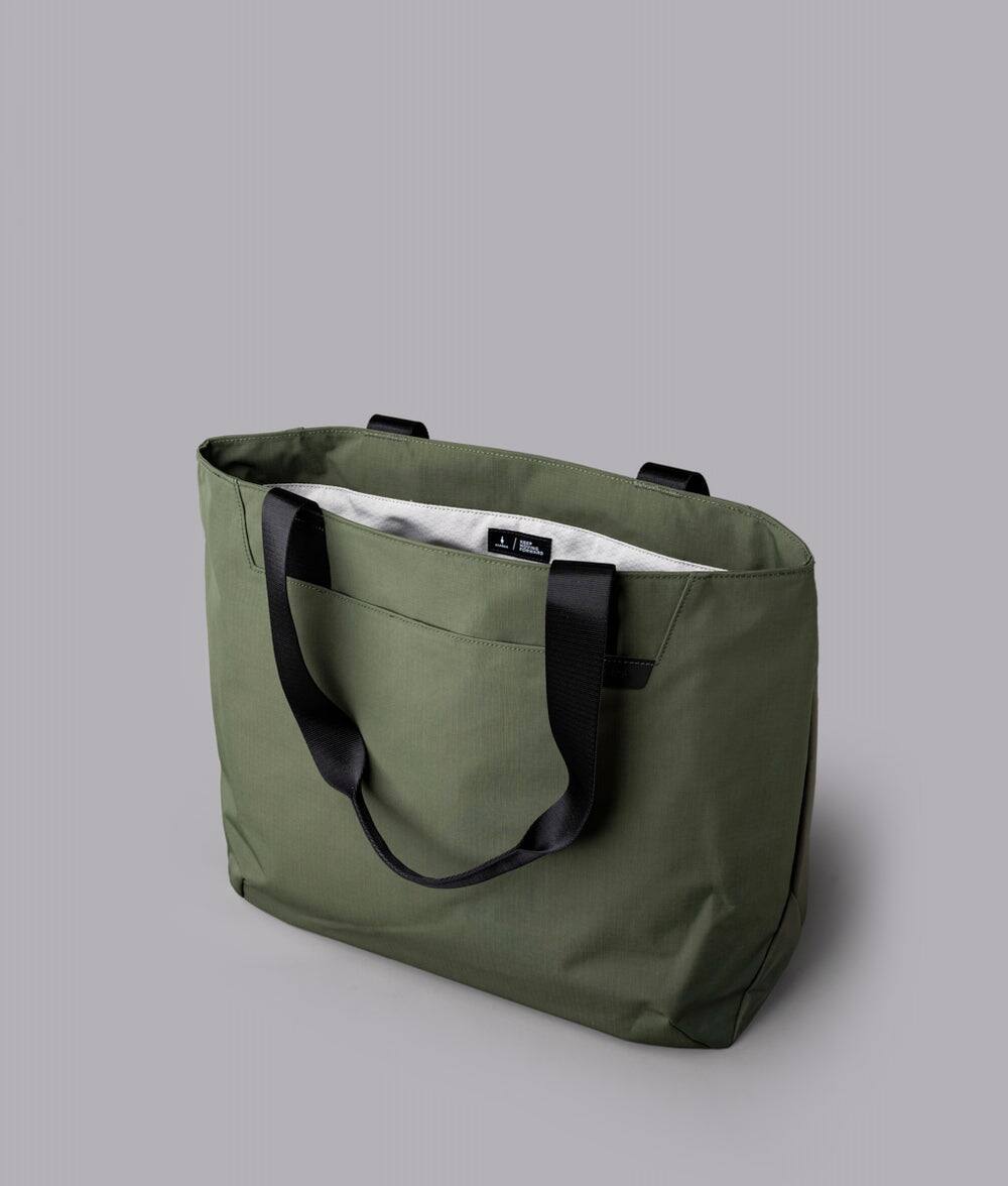 Alt View 4. ALPAKA - Elements Tote 20L Laptop Tote Bag with Padded 16" Sleeve,Open Top with Magnetic Closure - Green Axoflux 210D.
