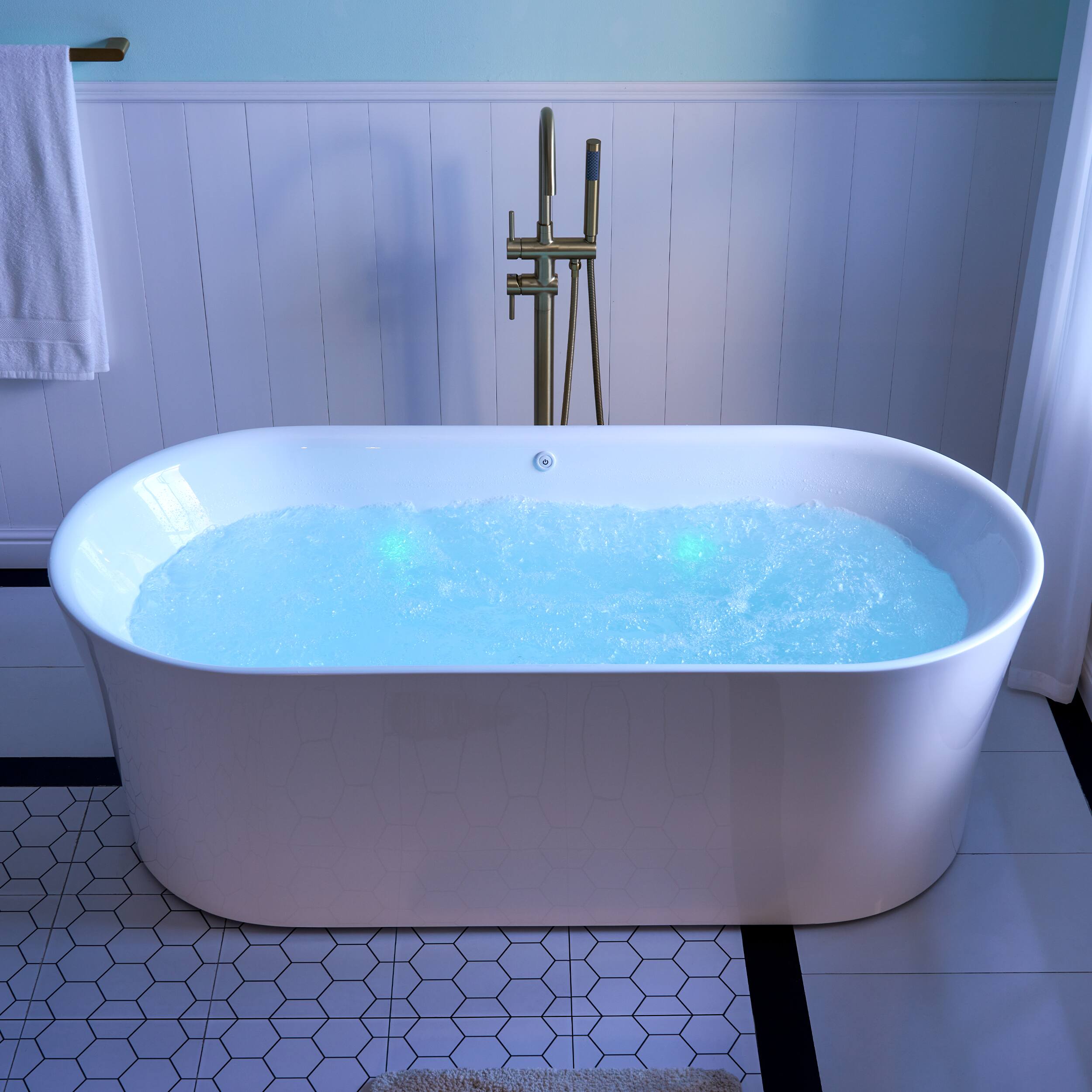 Front. WELLFOR - Liora 67 in. x 31.5 in. Acrylic Oval Freestanding Flat Bottom Air Bubble Massage and LED Bathtub with Drain and Overflow - White.