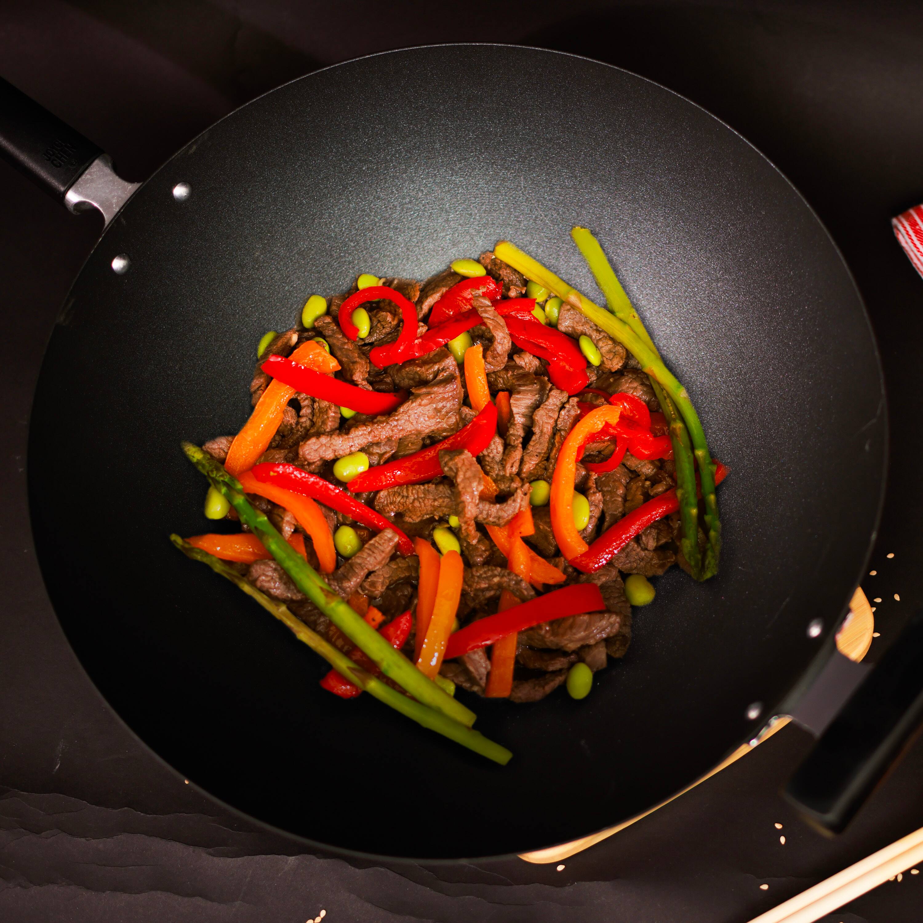 Alt View 5. Escali - Joyce Chen Professional Series 14-Inch Carbon Steel Ceramic Nonstick Flat Bottom Wok with Phenolic Handles - Black.