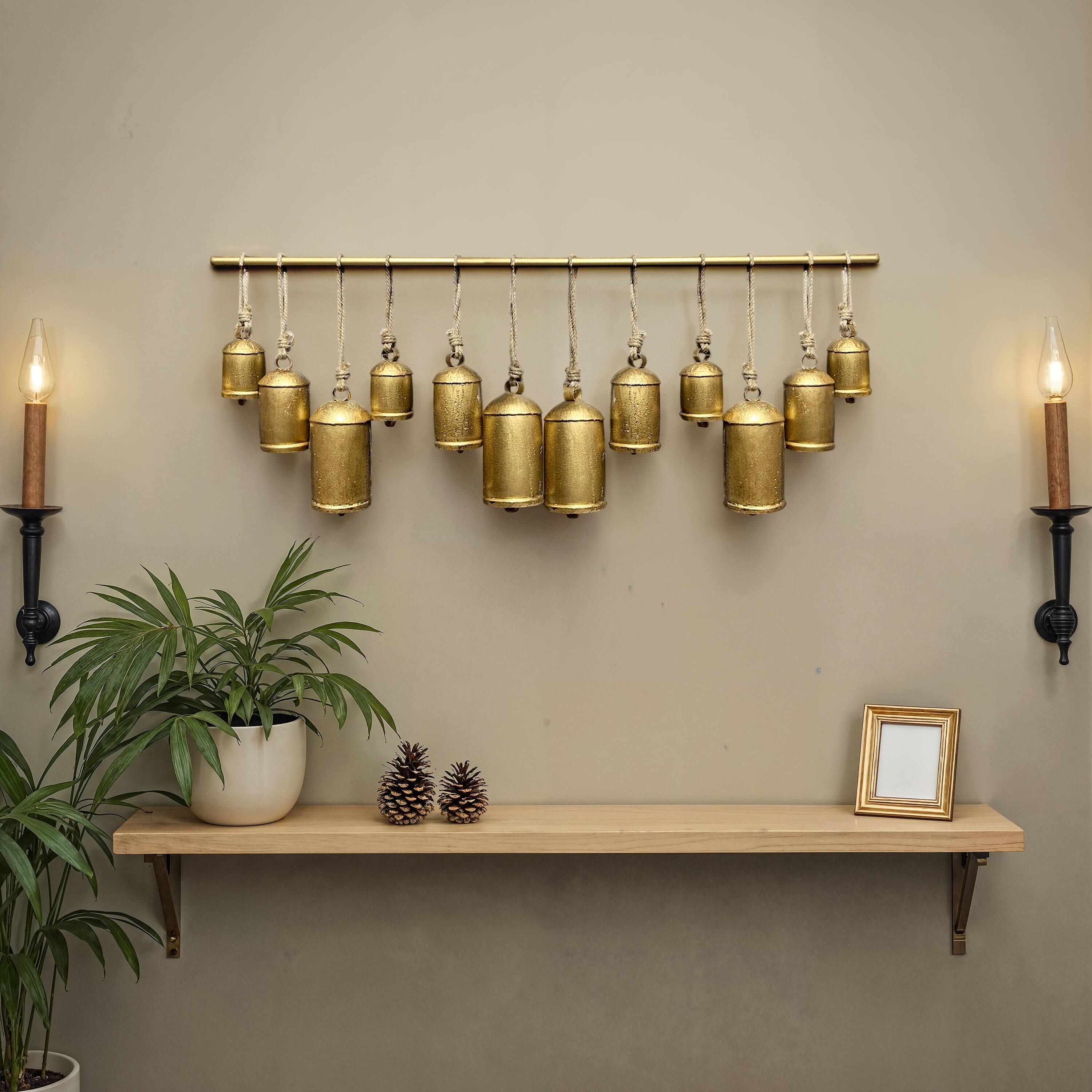 Alt View 9. Manhattan Lane - Neyra Iron Cow Bells Wall Decor 48 Inch Wide Decorative, Antique Gold Finish, Jute Hanging Rope - Gold.