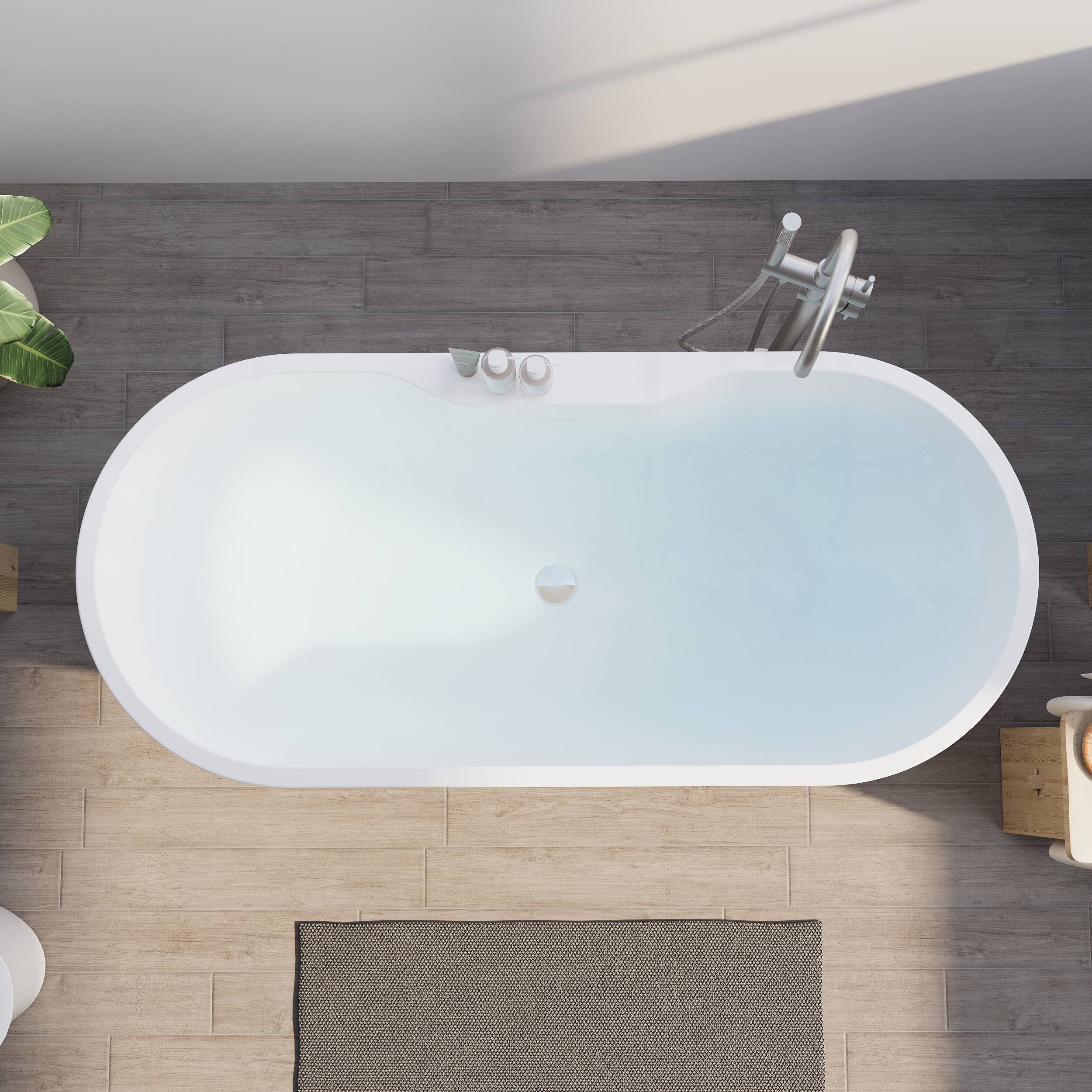 Left. WELLFOR - Nava 65 in. x 29.5 in. Acrylic Oval Freestanding Soaking Bathtub with Center Drain and Widened Deck for Storage - White.