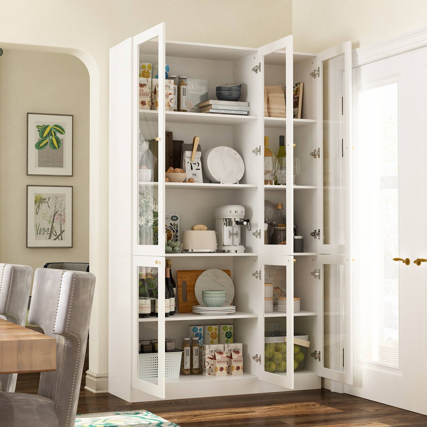 The image features a kitchen with a white pantry cabinet. The cabinet is filled with various items, including wine glasses, bottles, bowls, and books. There are also chairs placed around a dining table, which is located near the pantry. The scene appears to be a part of a living room, with a door leading to the kitchen. The arrangement of items in the pantry suggests that it is well-organized and functional for the homeowner.