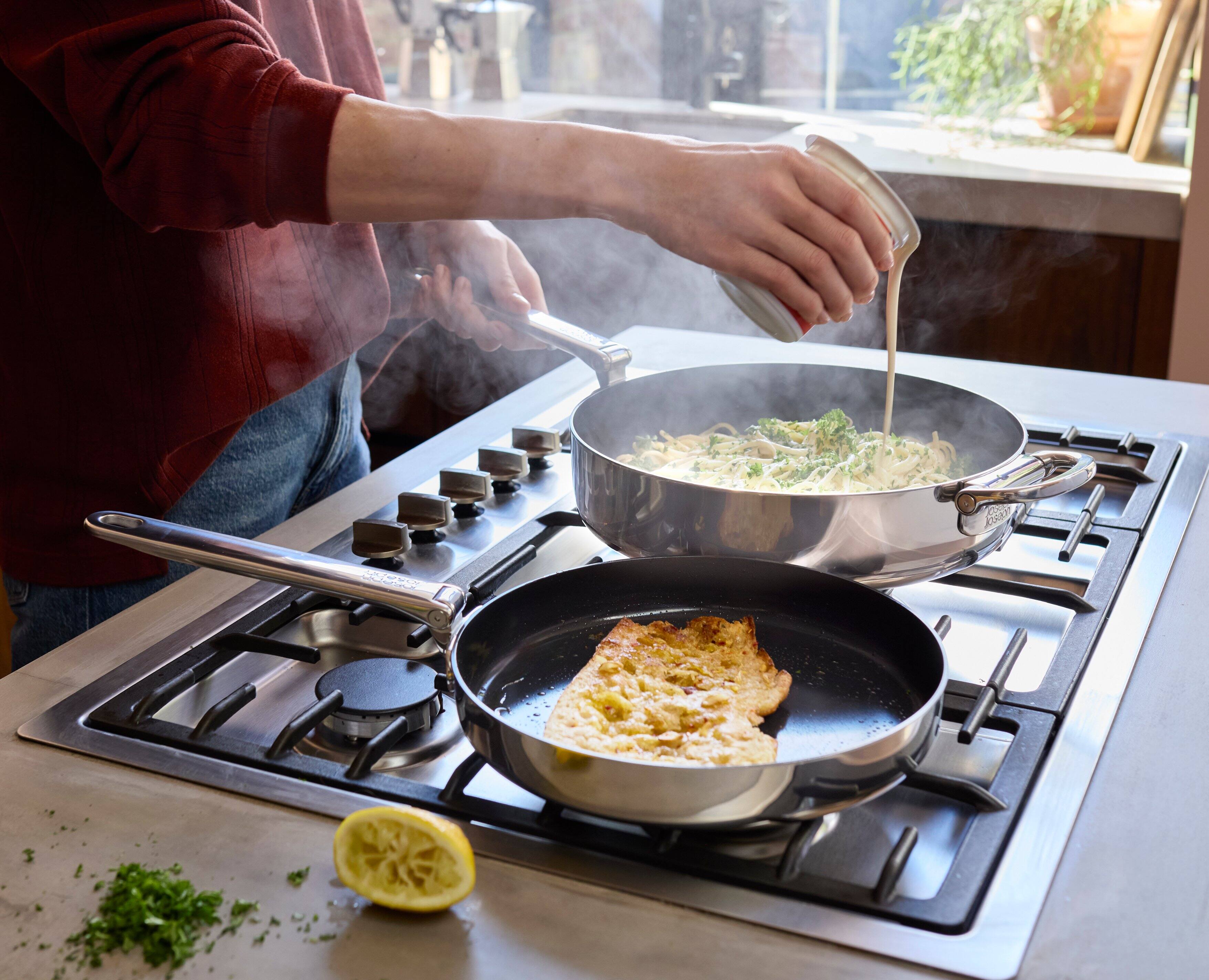 Alt View 2. Joseph Joseph - Space Steel 9.5'' Ceramic Non-stick Frying Pan with Folding Handle - Stainless Steel.