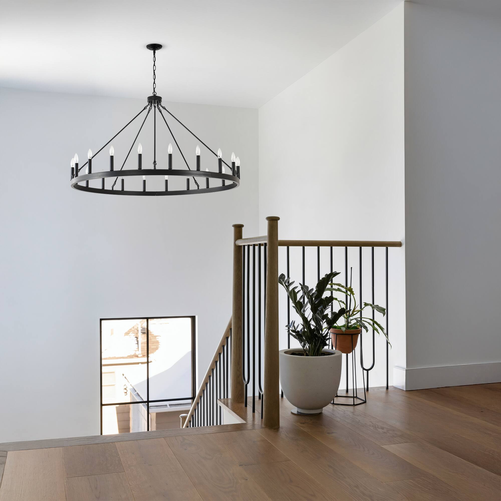 Left. RYHNUYNE - 53 Inch Large Black Farmhouse Wagon Wheel Chandelier 20-Light Industrial Rustic Pendant Light Fixture for High Ceiling - Black.