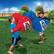 The image shows two young boys playing with oversized boxing gloves in a yard.