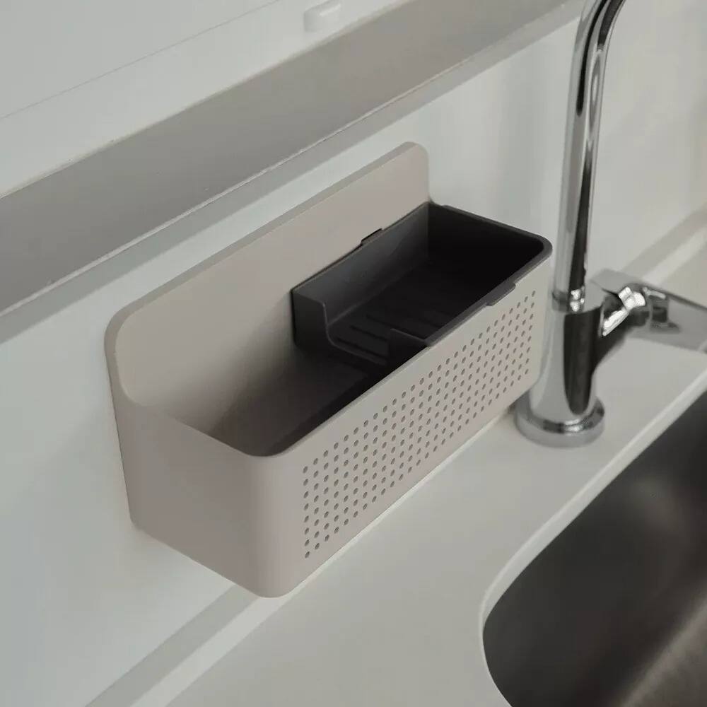 Angle. OU - Hanging Sink Organizer, Self‑Adhesive Caddy with Removable Sponge Tray for Kitchen Storage - Beige.