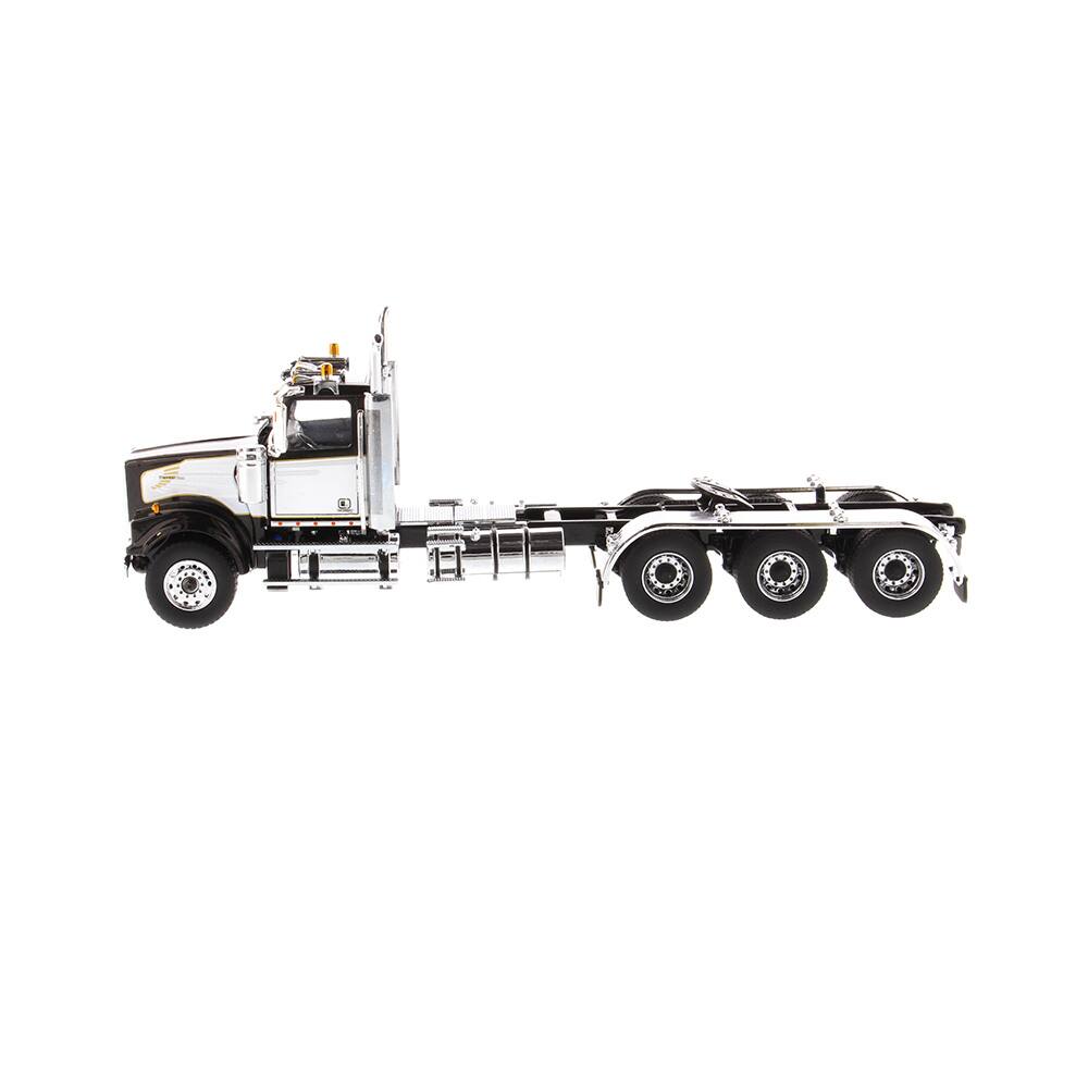 Angle. Diecast Masters - Western Star 4900 SF Tridem Day Cab Truck Tractor Black "Transport Series" 1/50 Diecast Model by Diecast Masters - Black.