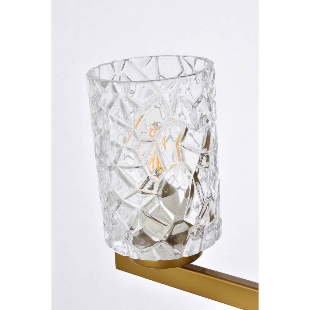 Left. Living District - Cassie 2 lights bath sconce in brass with clear shade - Brass And Clear Shade.