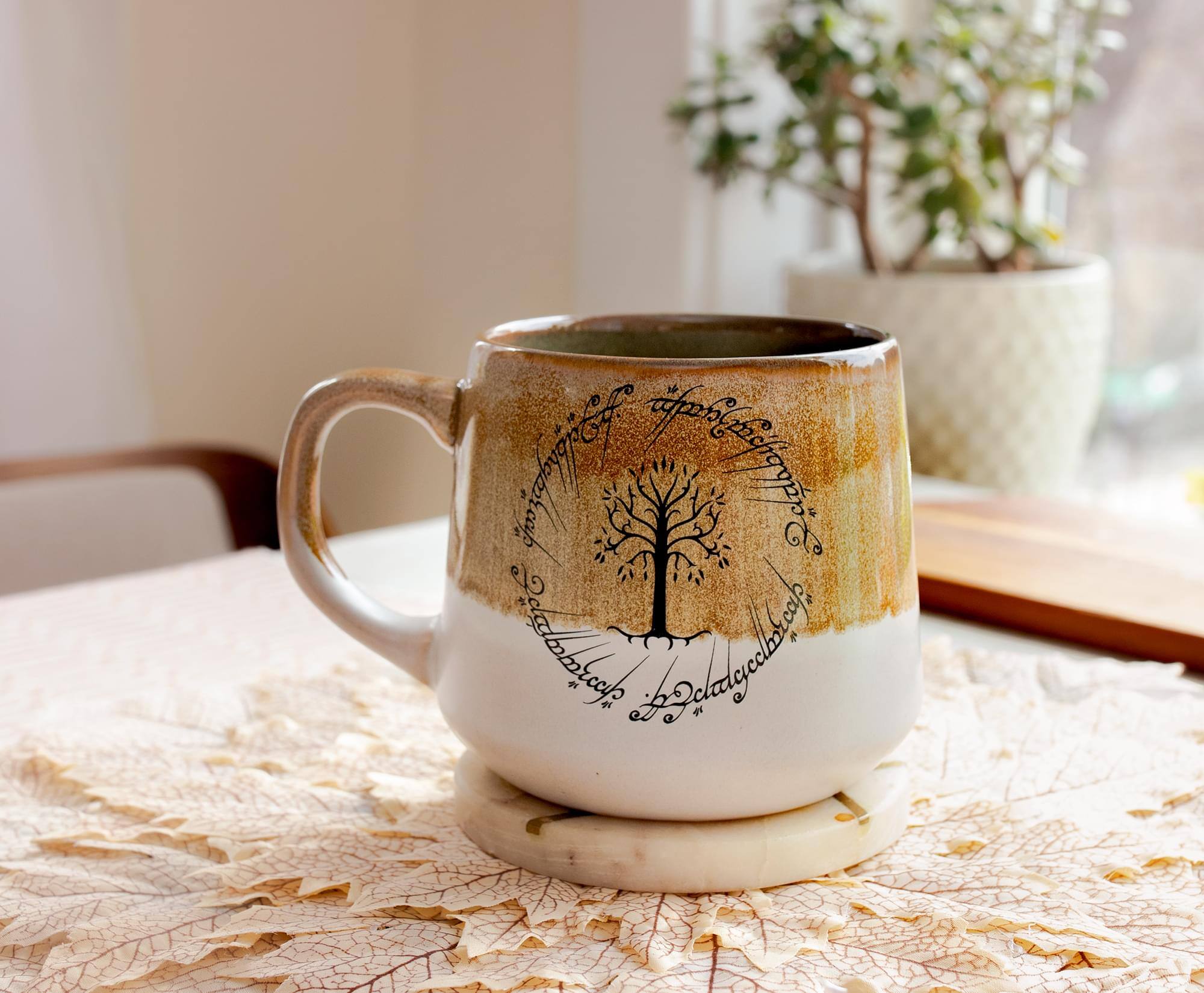 The text on the mug reads:

"Family Tree
Roots
Branches
Leaves
Family Tree
Leaves"