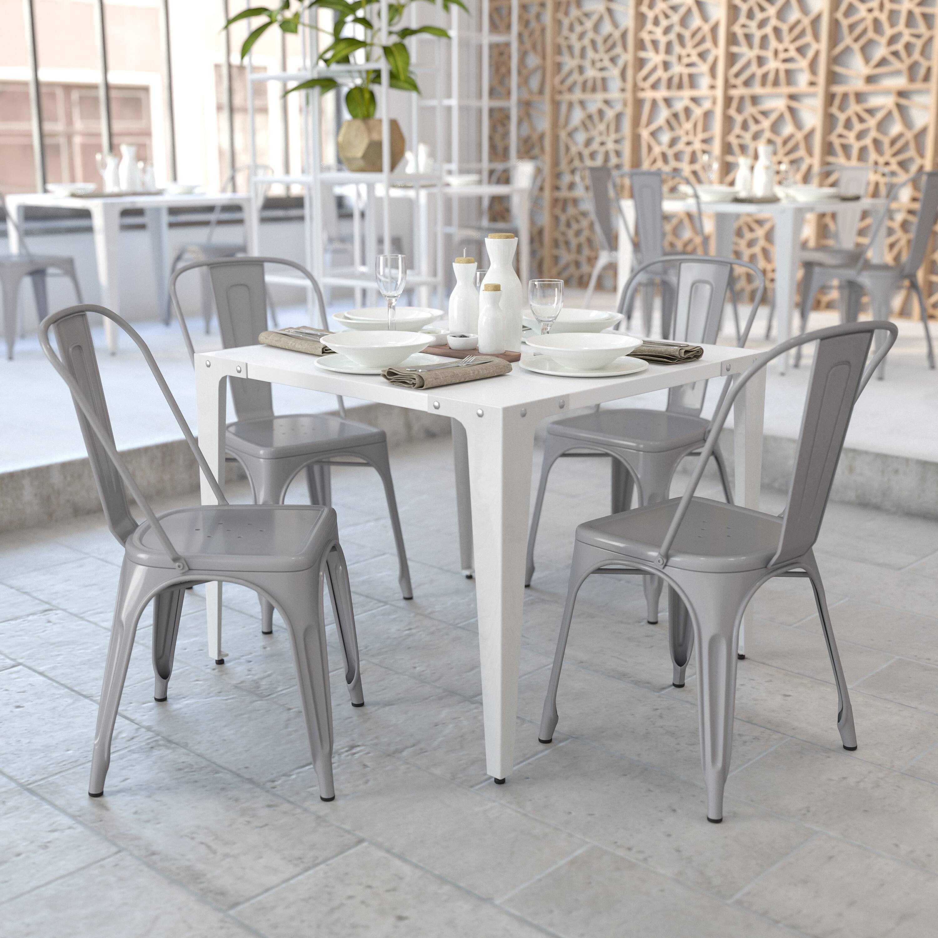 Alt View 2. Emma + Oliver - Commercial Grade 4 Pack Metal Indoor-Outdoor Stackable Chair - Silver.