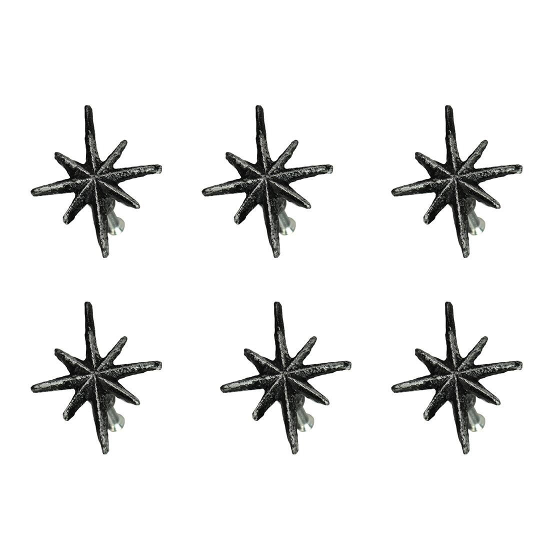 The image shows six black star-shaped decorations arranged in two rows of three.