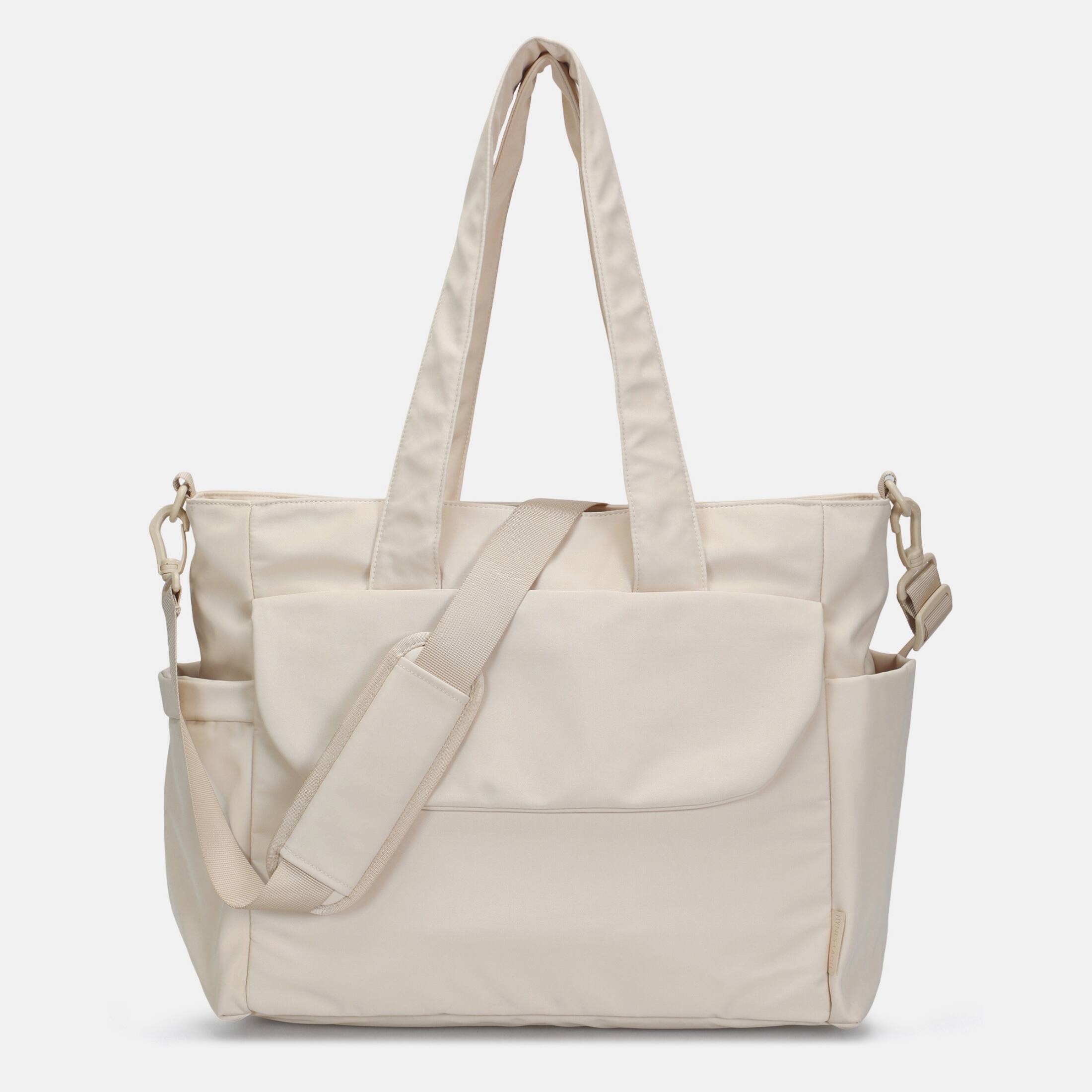 Front. Hynes Eagle - Motion All-in-One Diaper Tote - Soft Sand.