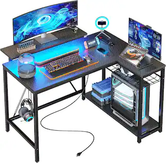 Bestier - L-Shaped Gaming Desk with Power Outlets LED Lights and Reversible Storage Shelves & Hooks - 42" Wide - Black Carbon Fiber