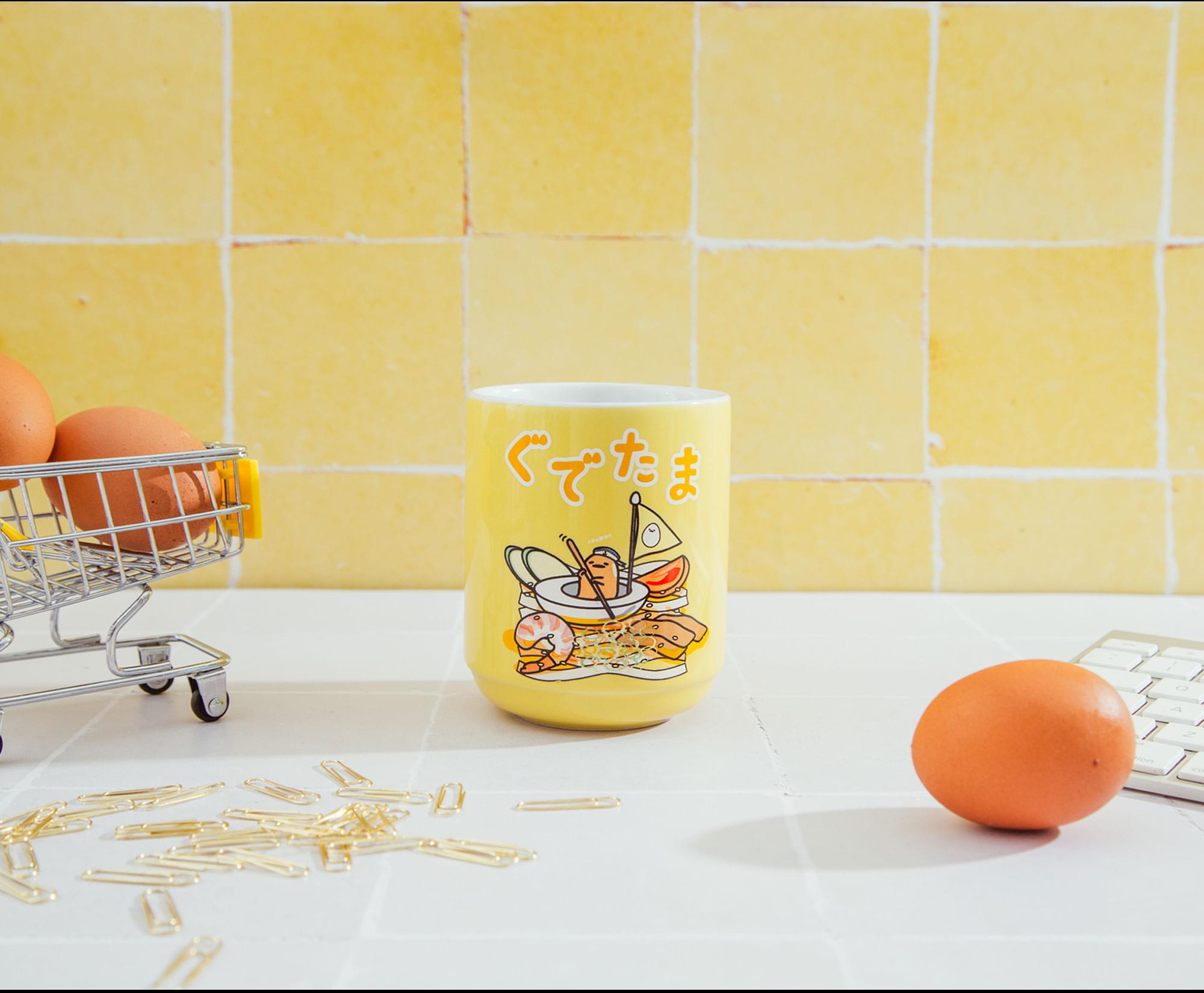 Alt View 1. Silver Buffalo - Sanrio Gudetama Sailing On Ramen Asian Ceramic Tea Cup | Holds 9 Ounces - Yellow.
