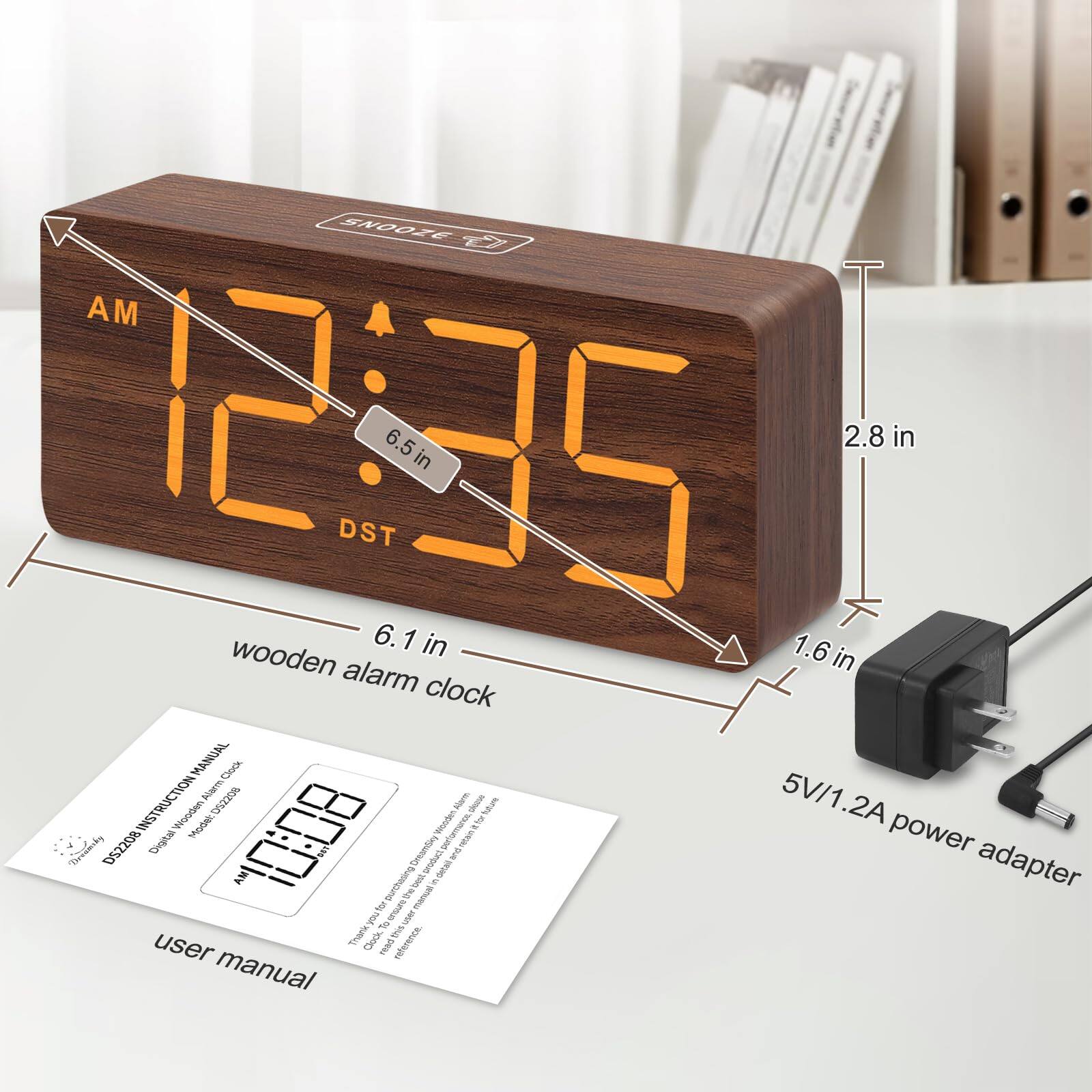 **Wooden Alarm Clock**

- Dimensions: 6.5 in (height) x 6.1 in (width) x 2.8 in (depth)
- Power Adapter: 5V/1.2A

**Features:**
- AM/PM Indicator
- DST (Daylight Saving Time) Indicator
- Snooze Button

**User Manual:**
- DS2208 Wooden Alarm Clock
- Instruction Manual

**Thank you for choosing this product.**