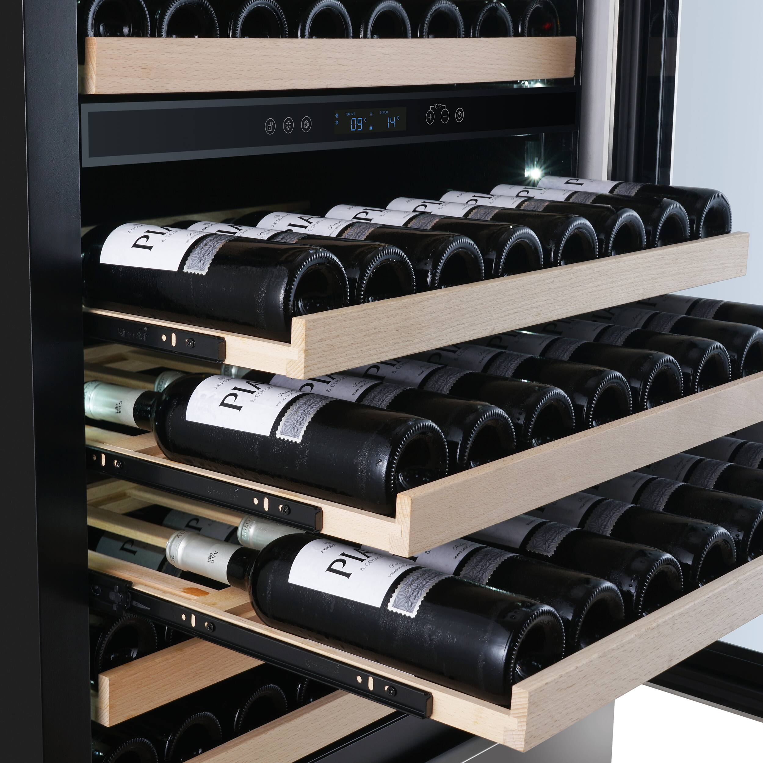 A wine cellar with a variety of wine bottles, including a bottle of Pia.