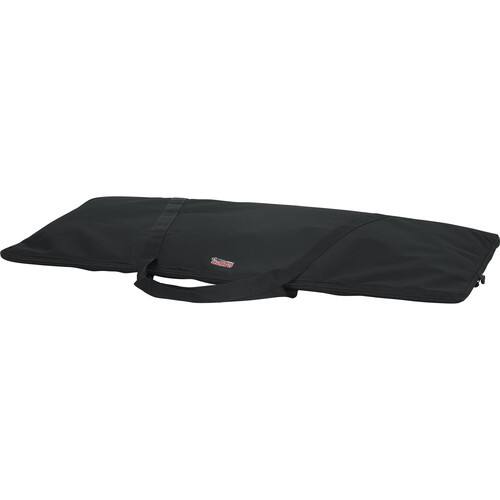Left. Gator - Economy 61-Key Keyboard Bag, Lightweight Envelope-Style Design,Durable Nylon Web Handles and 600D Nylon Exterior - Black.