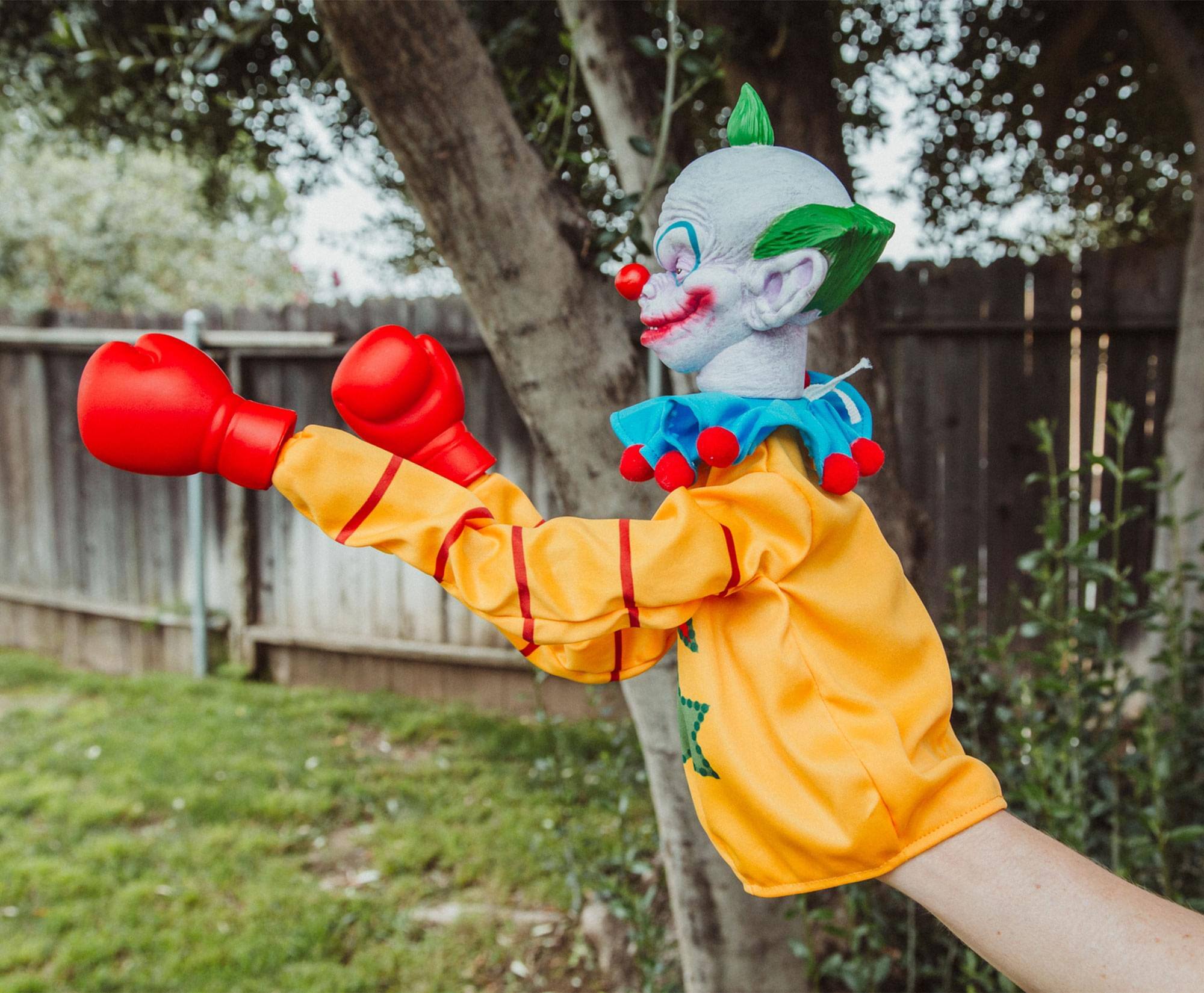 Alt View 3. Toynk - Horror Reachers Killer Klowns Shorty 13-Inch Boxing Puppet | Toynk Exclusive - Yellow.