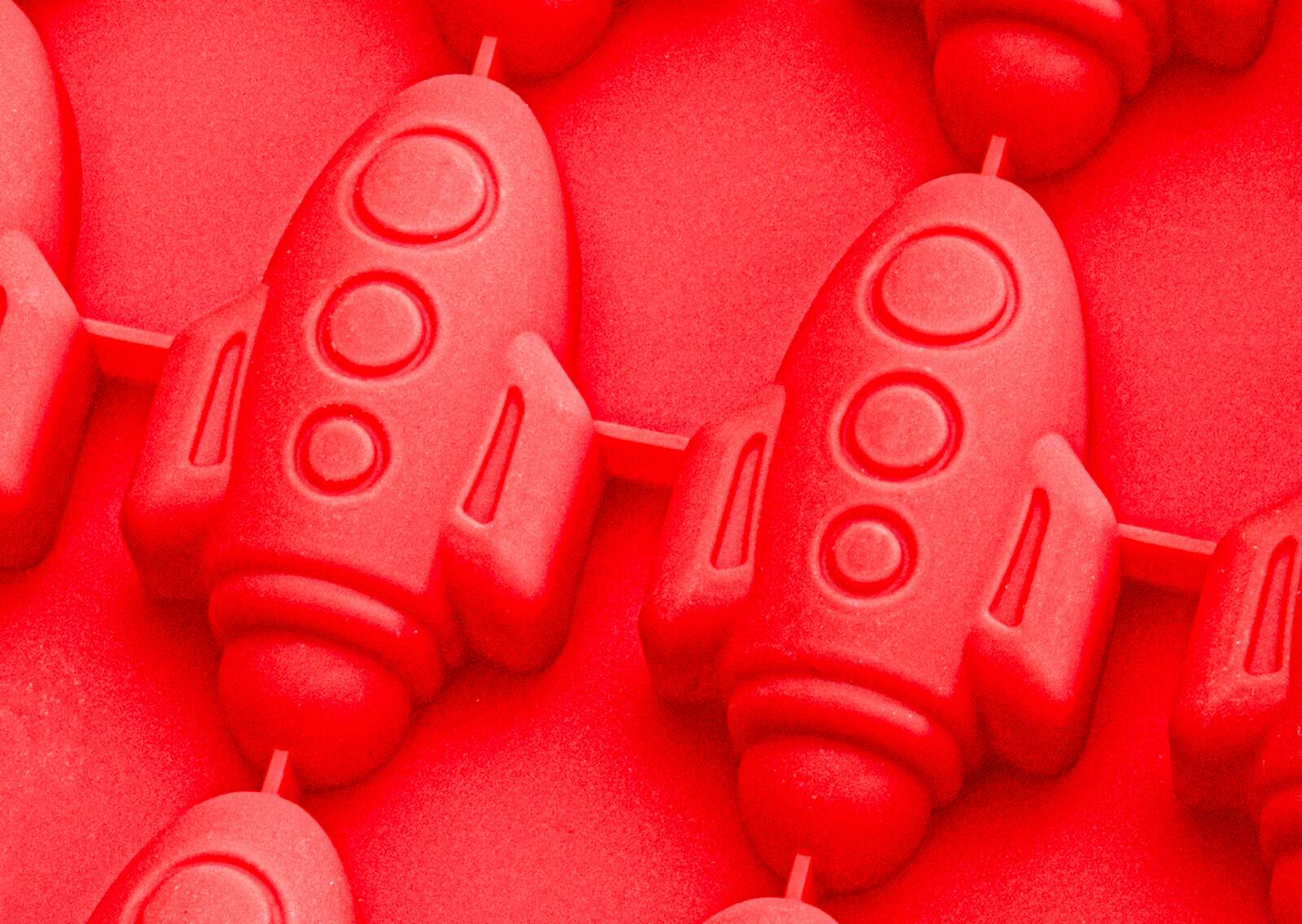 Alt View 1. MOBI - 12 Pigs in a Blanket Silicone Snack Mold, Mini Rocket Dogs - Red.
