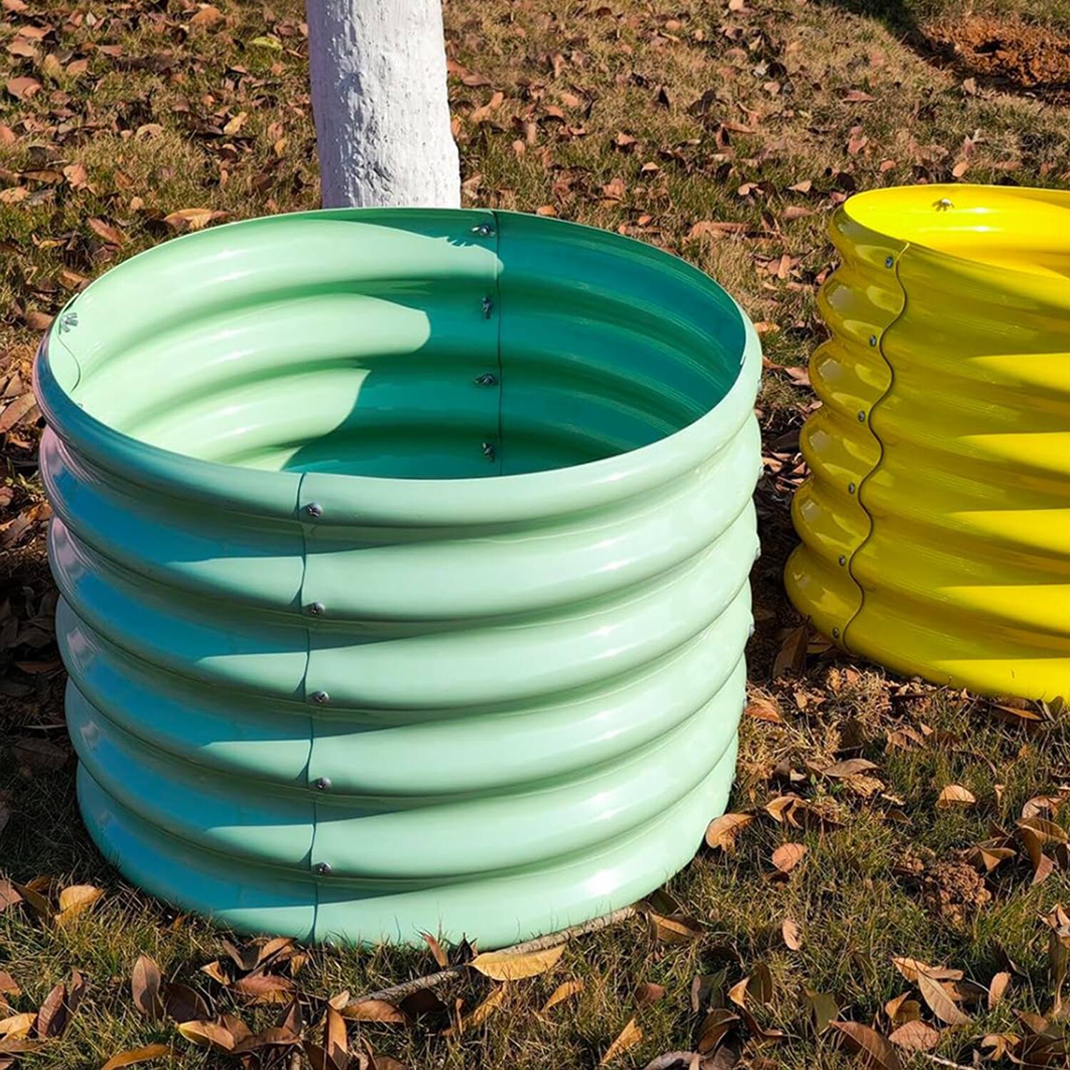 Left. A Anleolife - 4-Pack Kids Mini Green Metal Circle Raised Garden Bed Planter Box for Vegetables (24 in. L x 24 in. W x 18 in. H) - Green.