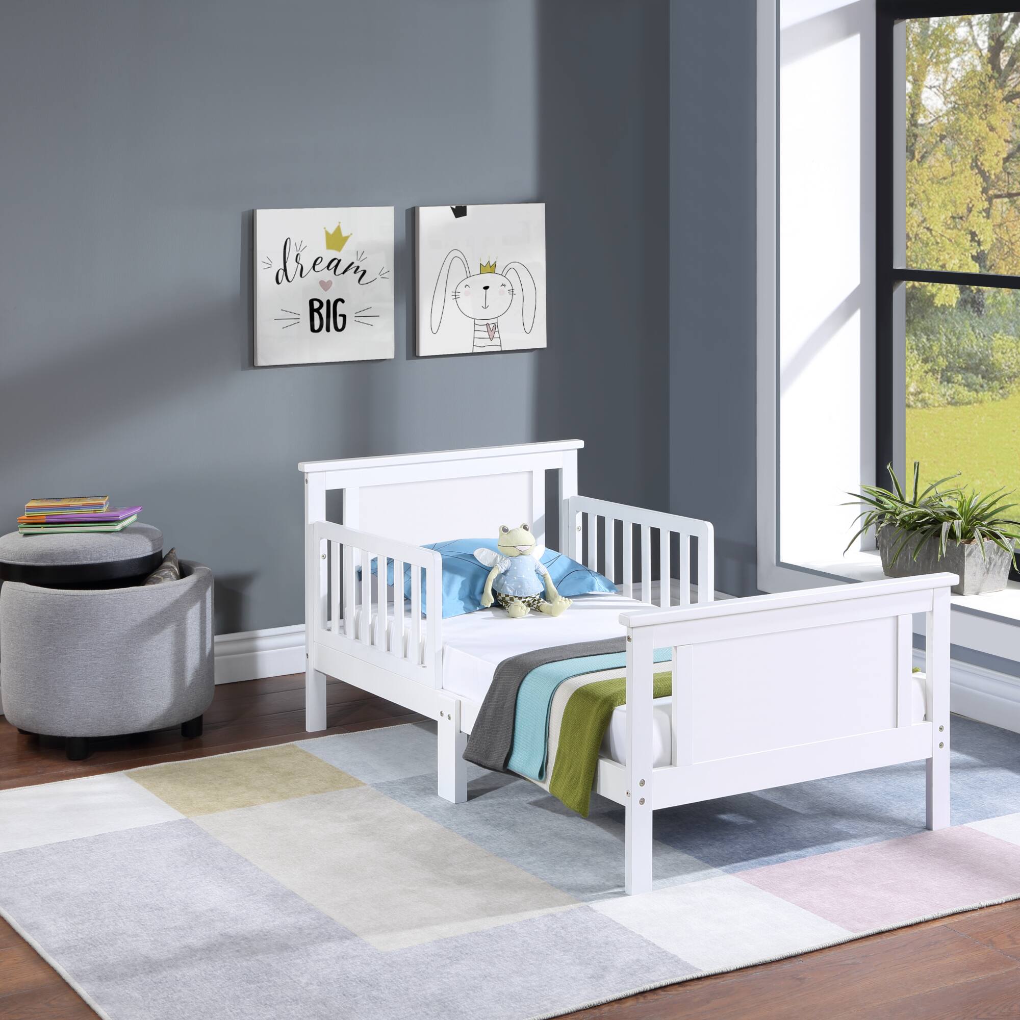 Left. GOODSILO - Reversible Panel Toddler Bed with Dual-Tone Finish for Growing Children, Solid Wood Construction - White.