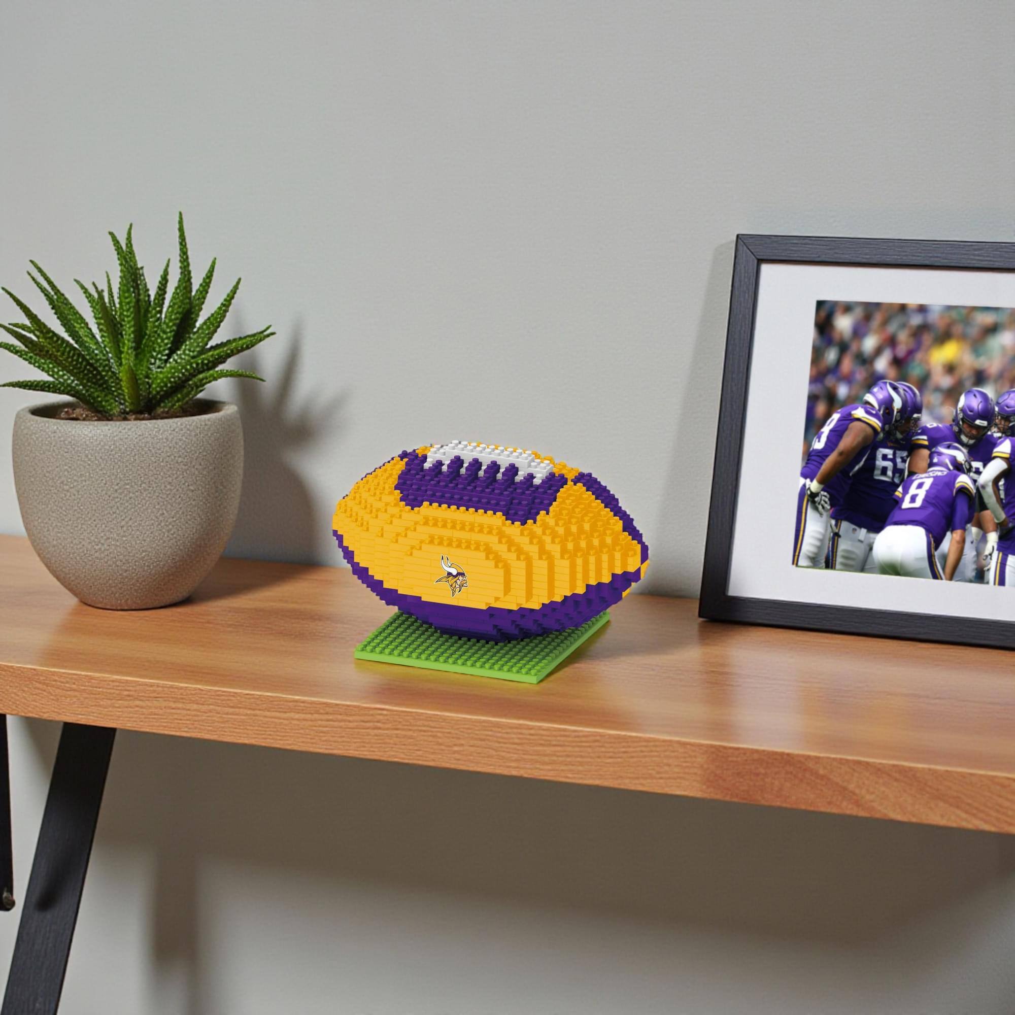 Alt View 2. Forever Collectibles - Minnesota Vikings NFL BRXLZ Football 704-Piece Building Block Set - Yellow.