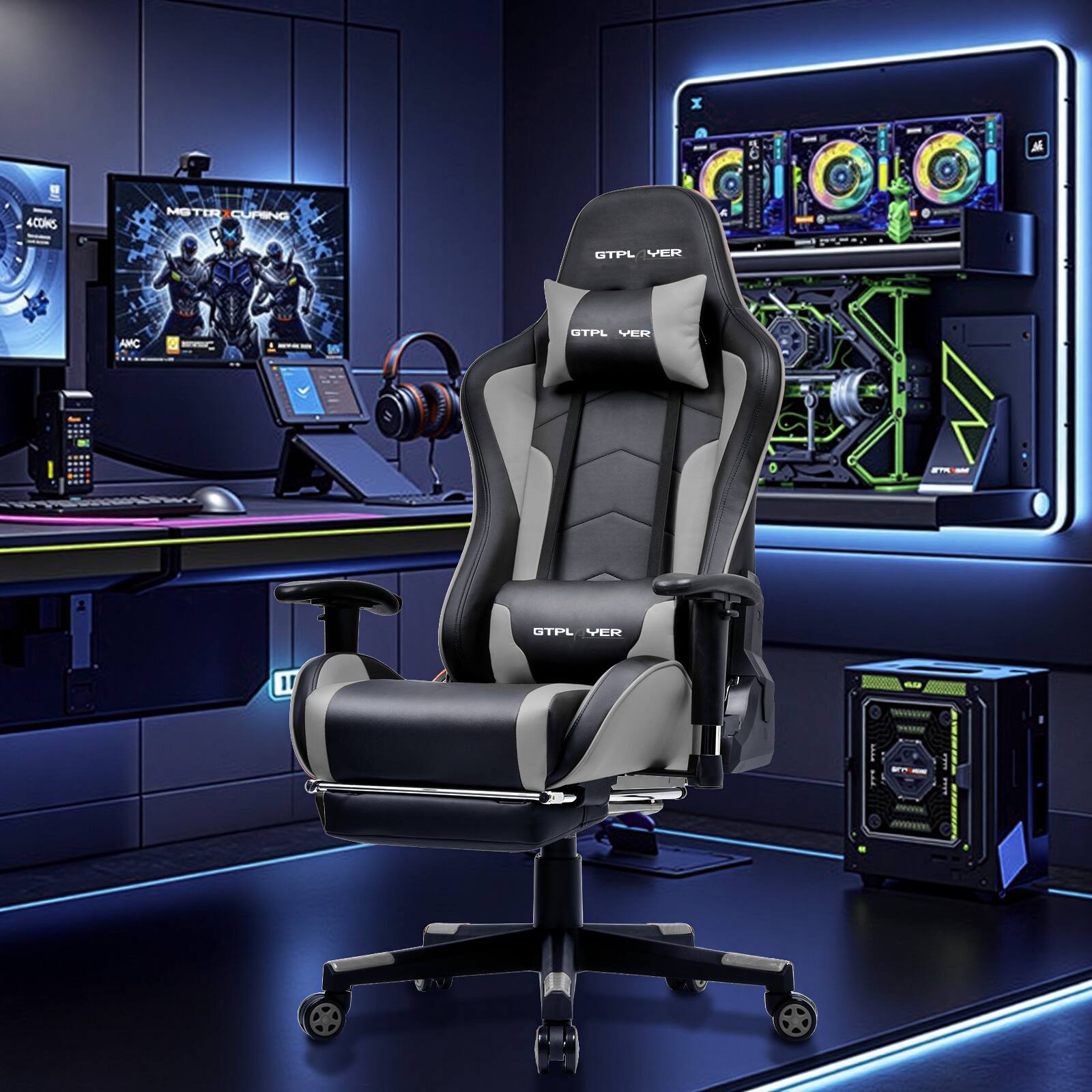 The image features a black and grey gaming chair positioned in front of a desk. The desk has a computer monitor, keyboard, and mouse on it. There are also two TVs in the room, one on the left side and another on the right side. The room is designed for gaming and entertainment, with the chair and desk setup providing a comfortable space for playing video games.