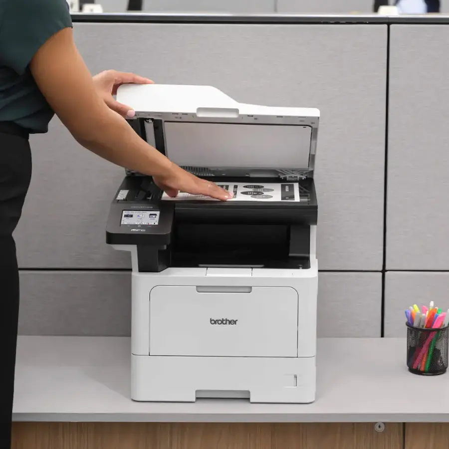 "I am holding a printer from the Brother company."