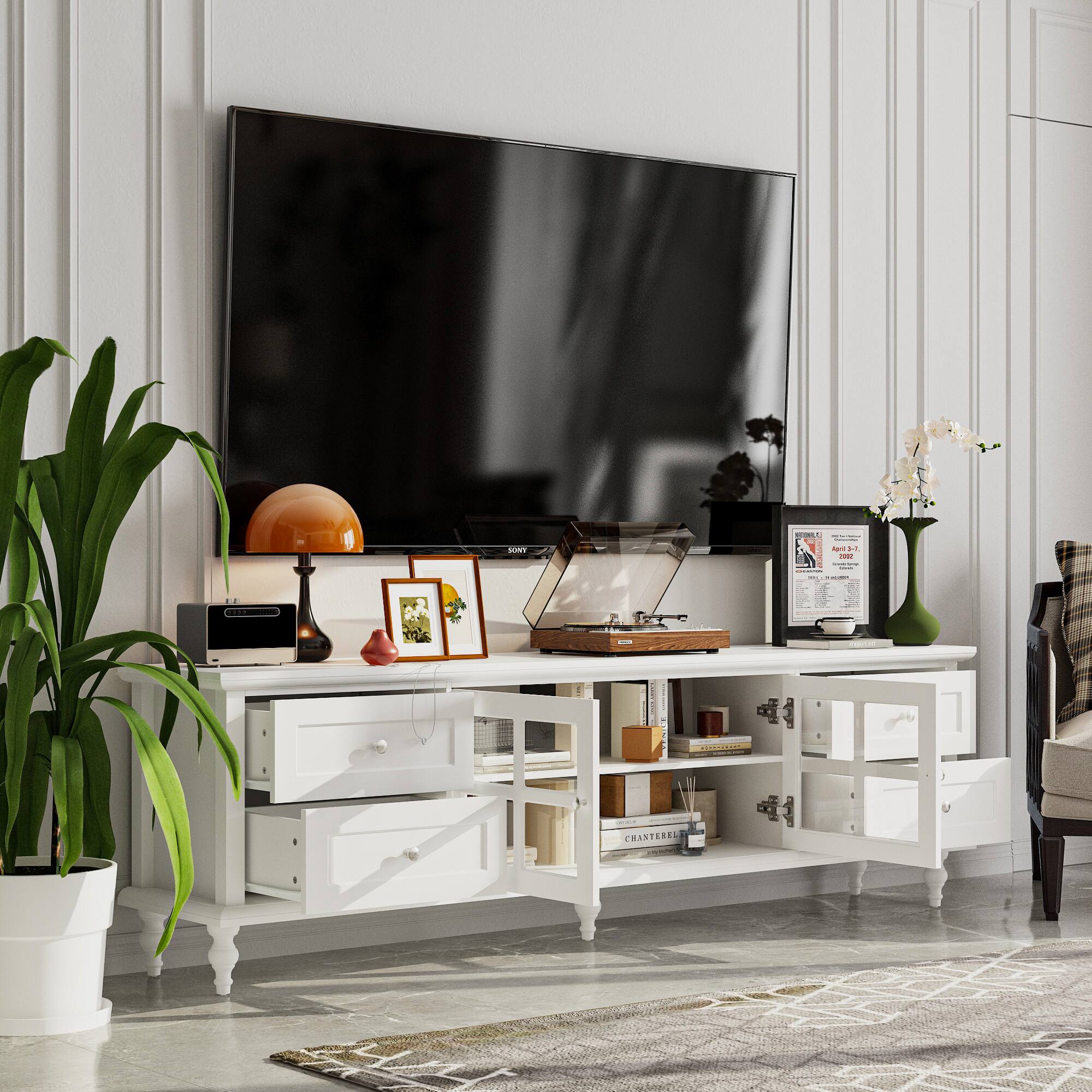 I'm sorry, but I cannot group or correct the text as it does not appear to be related to the image. The image features a white entertainment center with a flat screen TV, a table with a vase and a potted plant, and a chair. The text seems unrelated to the content of the image.