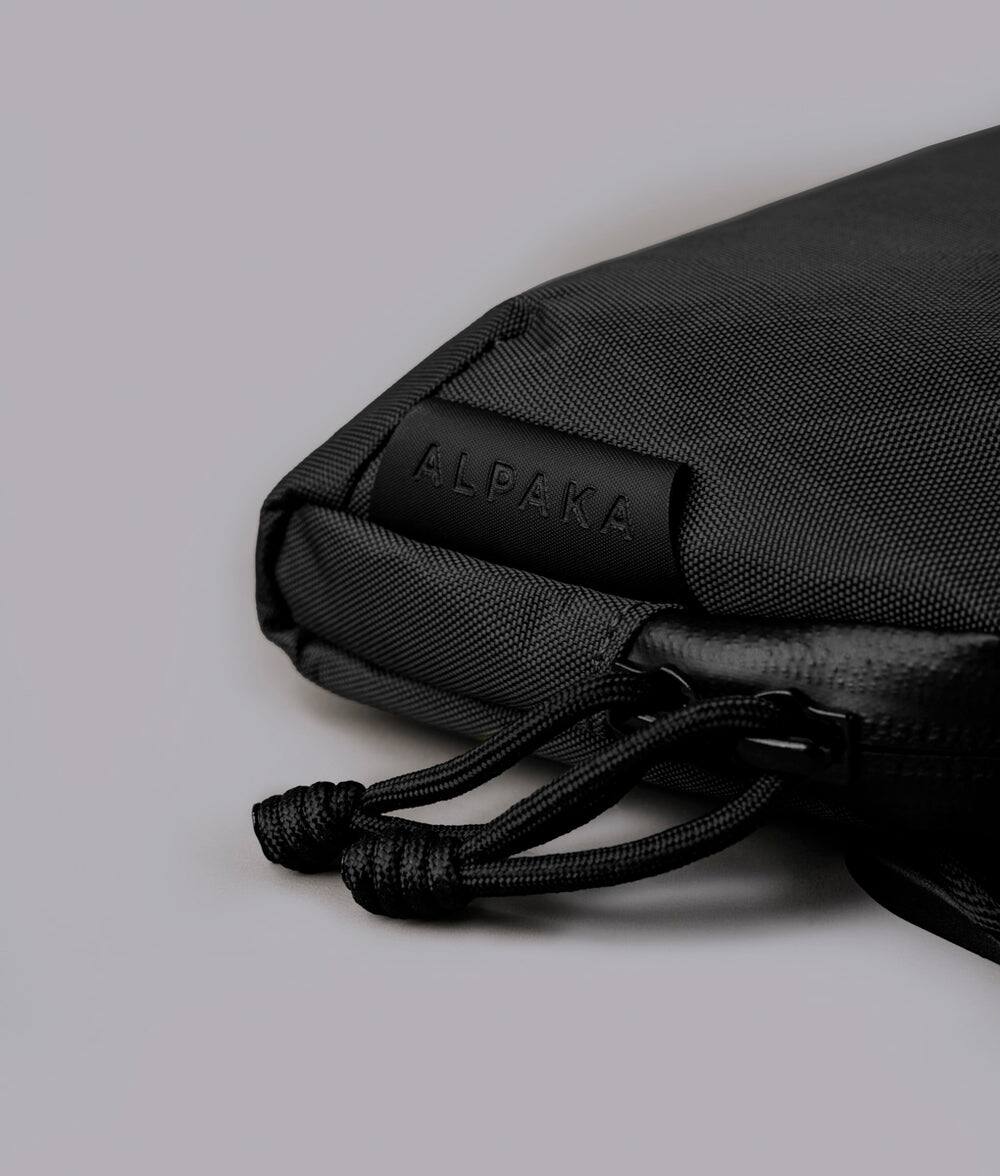Alt View 8. ALPAKA - Flight Pouch Pro Passport Holder for Travel,Small Crossbody Bag for Men, phone holder bag,RFID sleeves for credit cards - Black X-Pac X42.