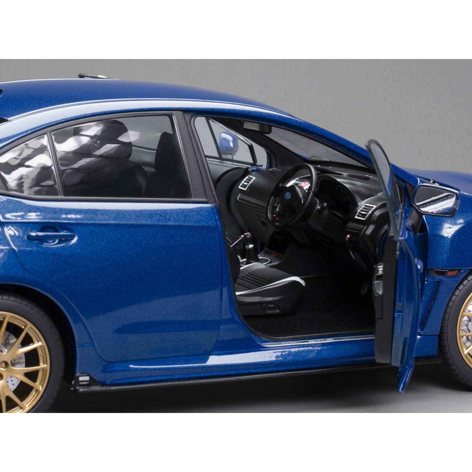 Alt View 3. Sun Star - Subaru WRX STI EJ20 Final Edition RHD (Right Hand Drive) Blue Metallic with Gold Wheels 1/18 Diecast Model by Sun Star.