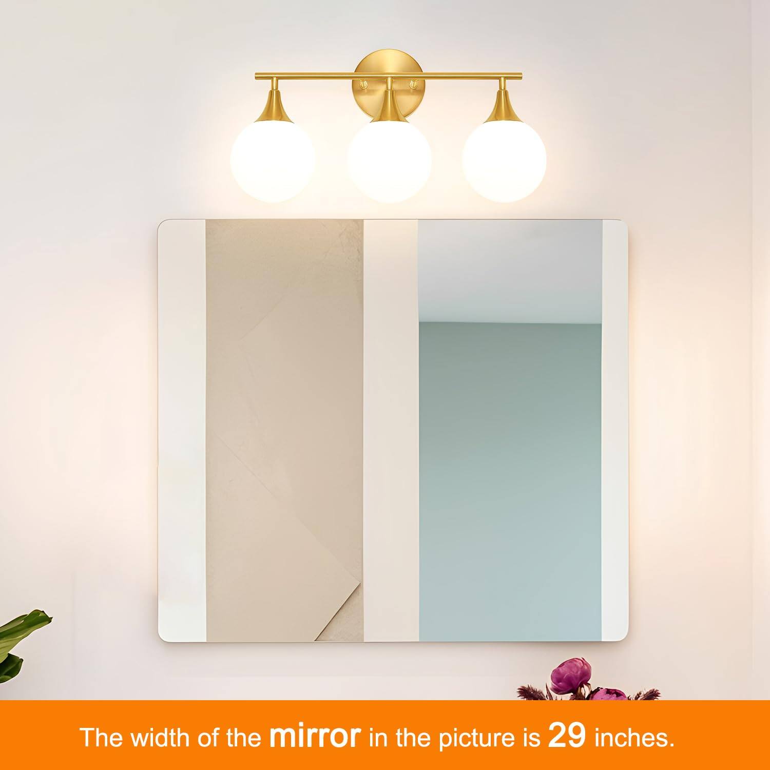The width of the mirror in the picture is 29 inches.