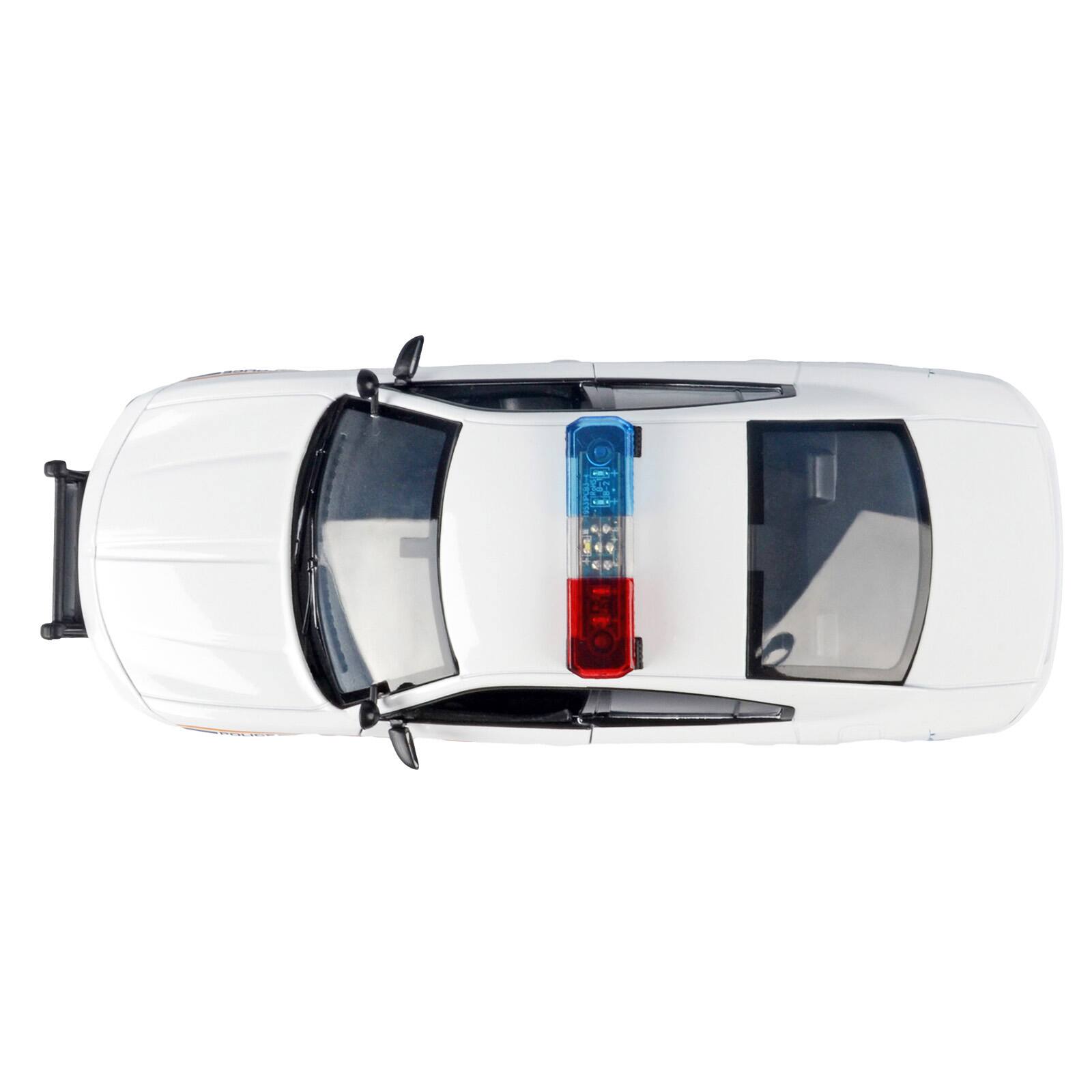 Alt View 4. Motormax - 2023 Dodge Charger Pursuit Police Car "RCMP" White with Flashing Light Lights and Sound 1/24 Model Car by Motormax.