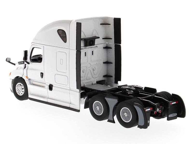 Left. Diecast Masters - Freightliner New Cascadia Sleeper Cab Truck Tractor Pearl White 1/50 Diecast Model by Diecast Masters - White.
