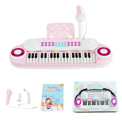 The image features a pink keyboard with a microphone attached to it, along with a book of 20 classic children's songs. The keyboard is designed for young children to play and learn music. The microphone allows the child to sing along with the songs, making it a fun and interactive learning experience. The book of songs provides a variety of tunes for the child to practice and enjoy, making it a great gift for any young music enthusiast.