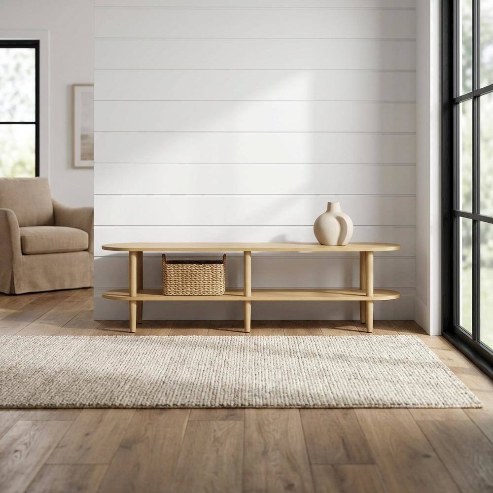 Angle. FurniFact - Brown wood TV stand with solid mango construction and oval design - Brown.