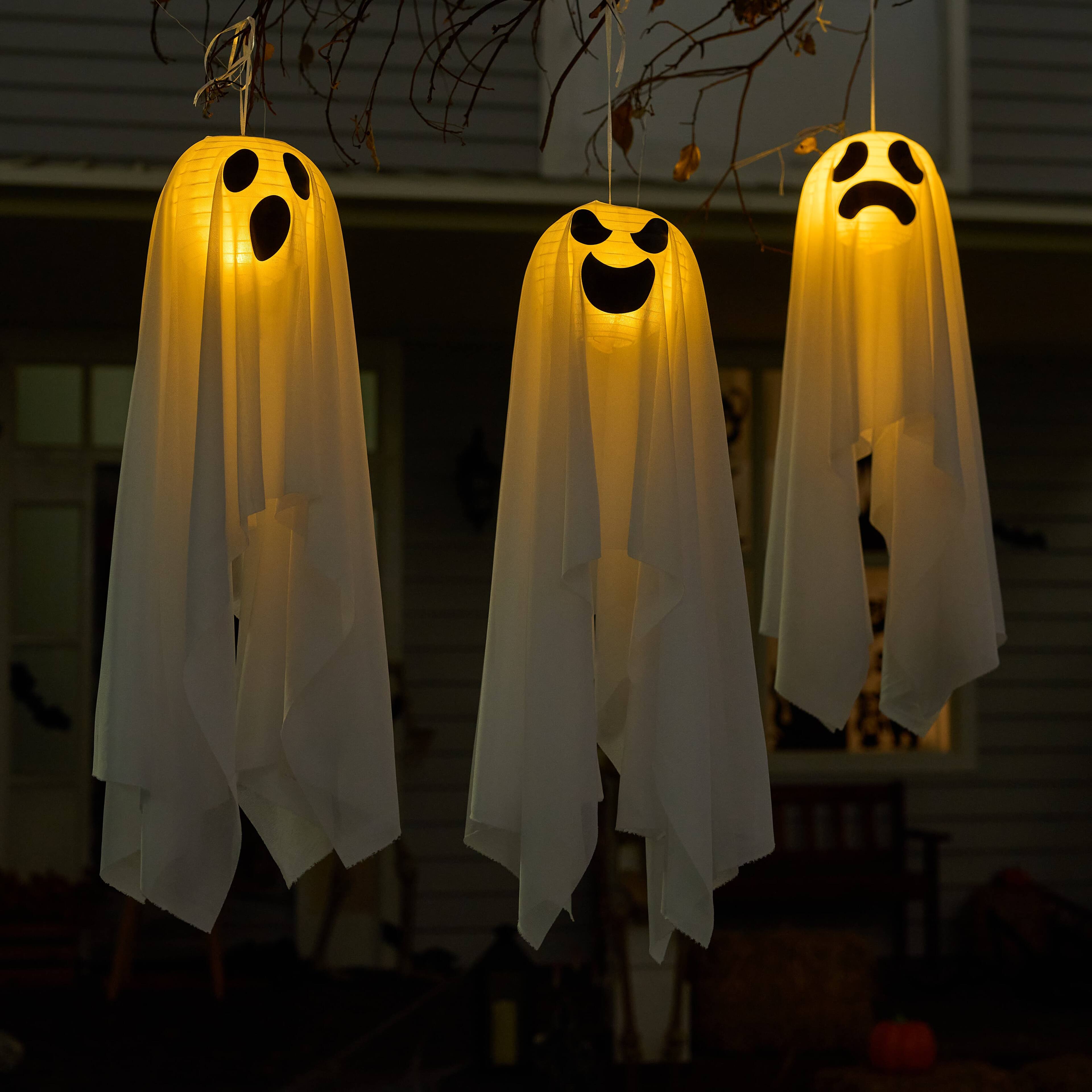 Left. Joyfy - 6 Pcs 27.5" Light-Up Hanging Ghosts Warm LED Flying Ghost Decor for Halloween Outdoor, Tree, Yard, Patio, Lawn & Garden - white.