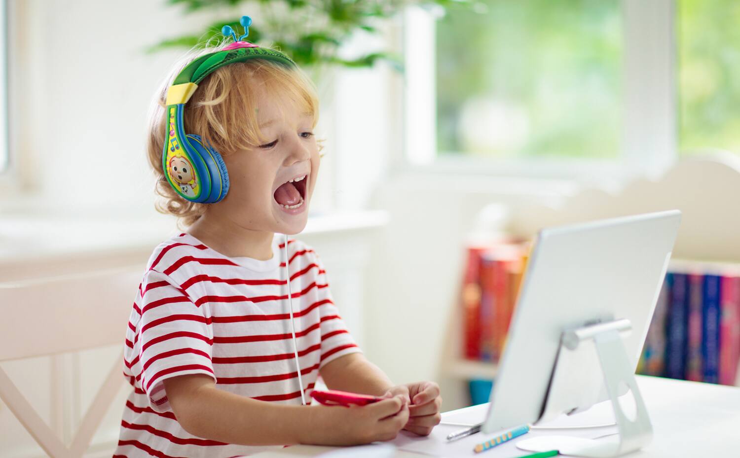 Left. eKids - eKids Cocomelon Wired Headphones for Kids, Children’s Headphones for School, Home, or Travel - Multicolor.