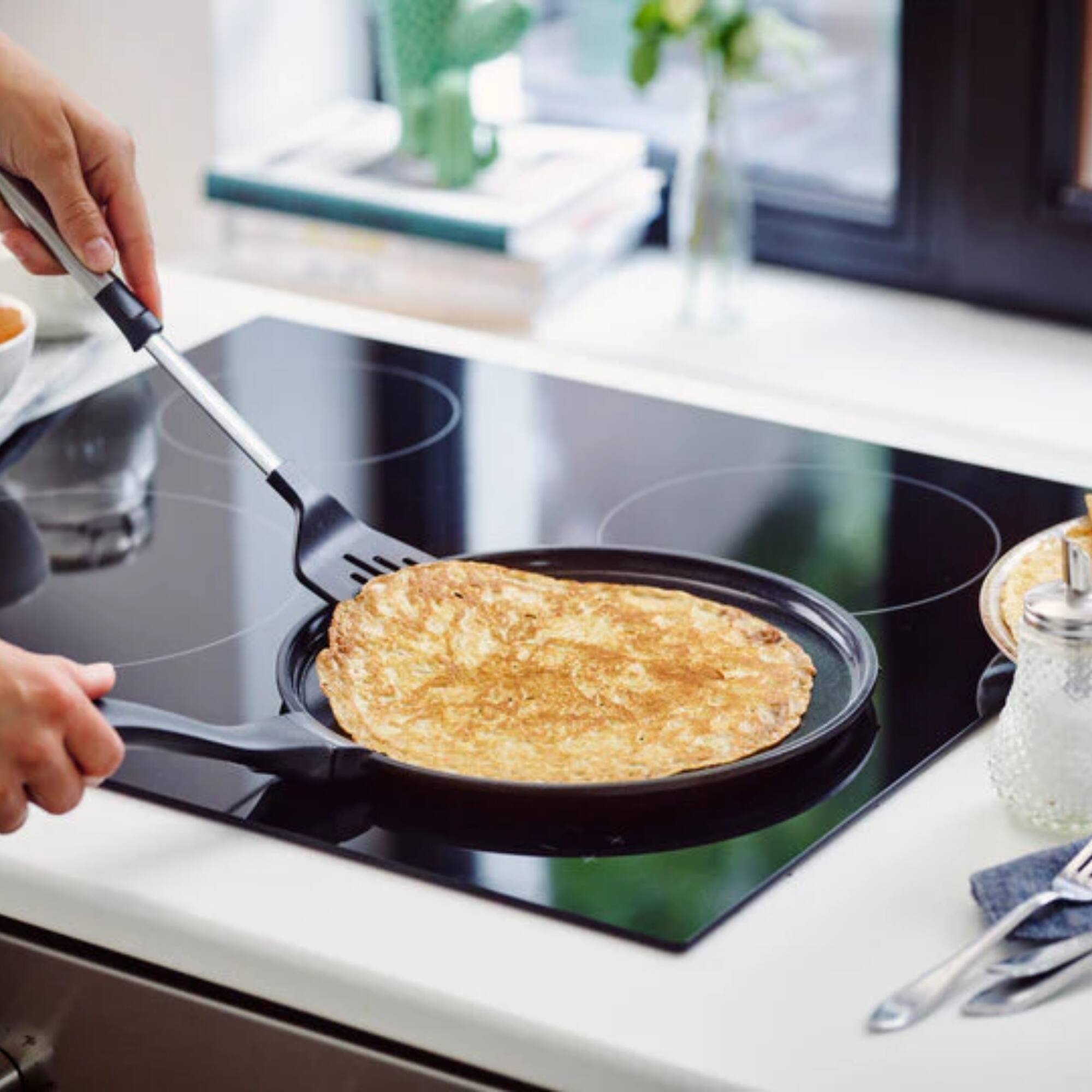 Angle. Alva - Alva Energy 11" Ceramic Nonstick Crepe Pan - Lightweight, Easy to Clean, PFAS-Free - Black.