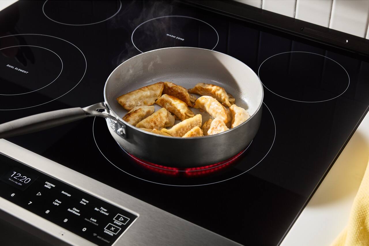 WARM ZONE DUAL ELEMENT 12:20 a CONPORM MENU 6 Settings 7 Oven Zone Wm Light 8 Clean Bet Timer Selt/Stoom Cancel 9 Lock D START o x CANCEL