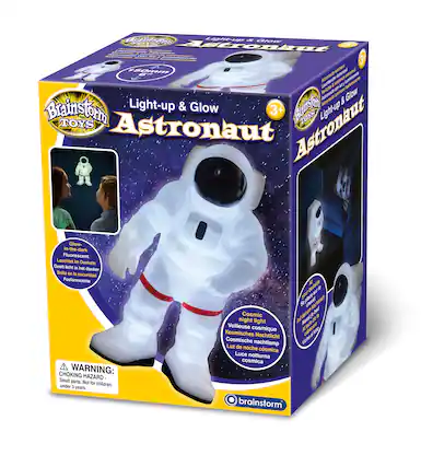 The text on the image is already grouped and correctly written. It reads: "Light-up & Glow Astronaut - 150mm enterprise Astronaut - Astronaut Glow-in-the-dark - Fluorescent - Choking Warning: Hazard - Small parts. Not for under 1 children years. Made at 124 Antenst Acronno & Glow Brainstorm Light-up TOYS TOYS Astronaut Astronaut Glow-in-the-dark - Fosforescente - Geeft licht in het donker - Brilla en a oscuridad - Cosmic 9 night light - Nachtlicht - Cosmische nachtlamp - Adatar Luz de noche - cosmica - Luce notturna cosmica - brainstorm."