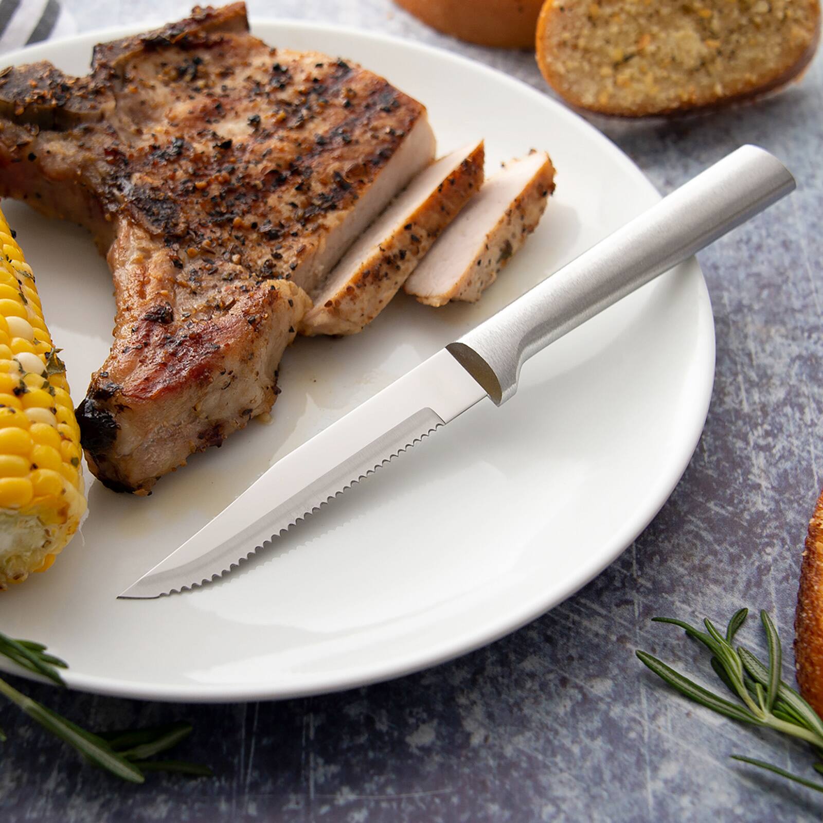 Alt View 3. Rada - 4 Piece Serrated Steak Knife Set with Gift Box, Silver Handles - Silver.
