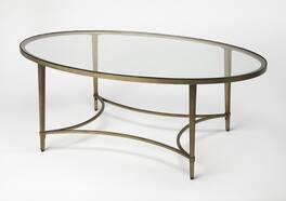 Butler Specialty - Monica 50 in. W Oval Glass and Metal Coffee Table - Gold