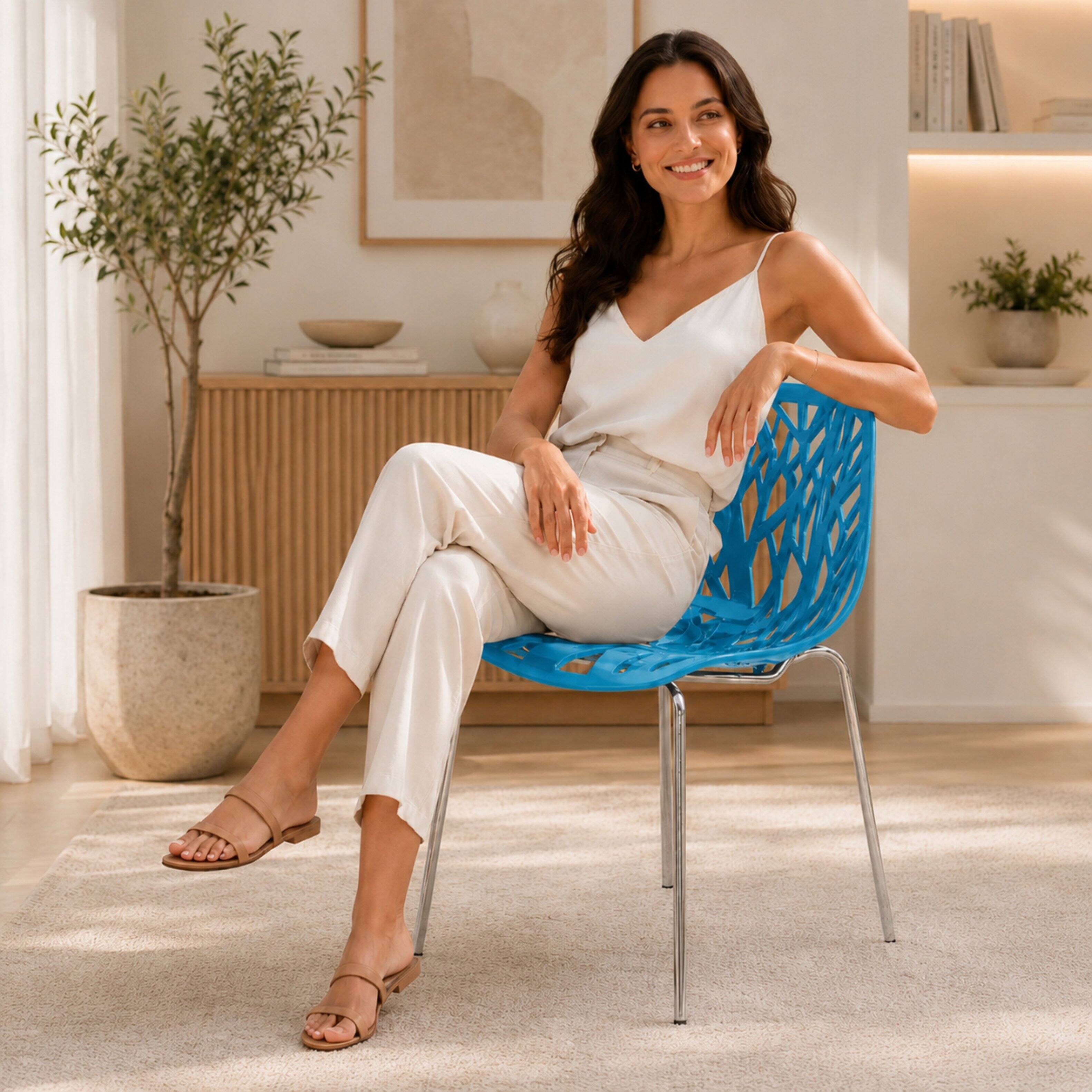 Angle. LeisureMod - Asbury Stackable Modern Dining Chair with Cut Out Design and Chrome Legs Side Chair for Home Living Room - Blue.