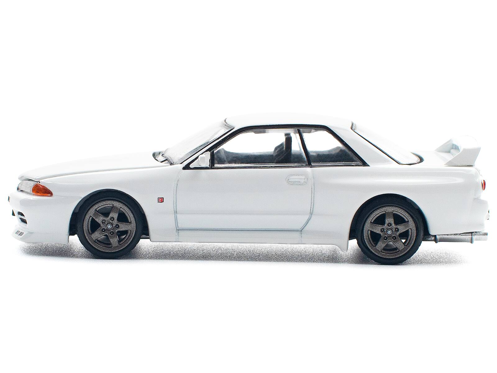 Left. Pop Race - GTR R32 RHD (Right Hand Drive) Crystal White 1/64 Diecast Model Car by Pop Race - Crystal White.
