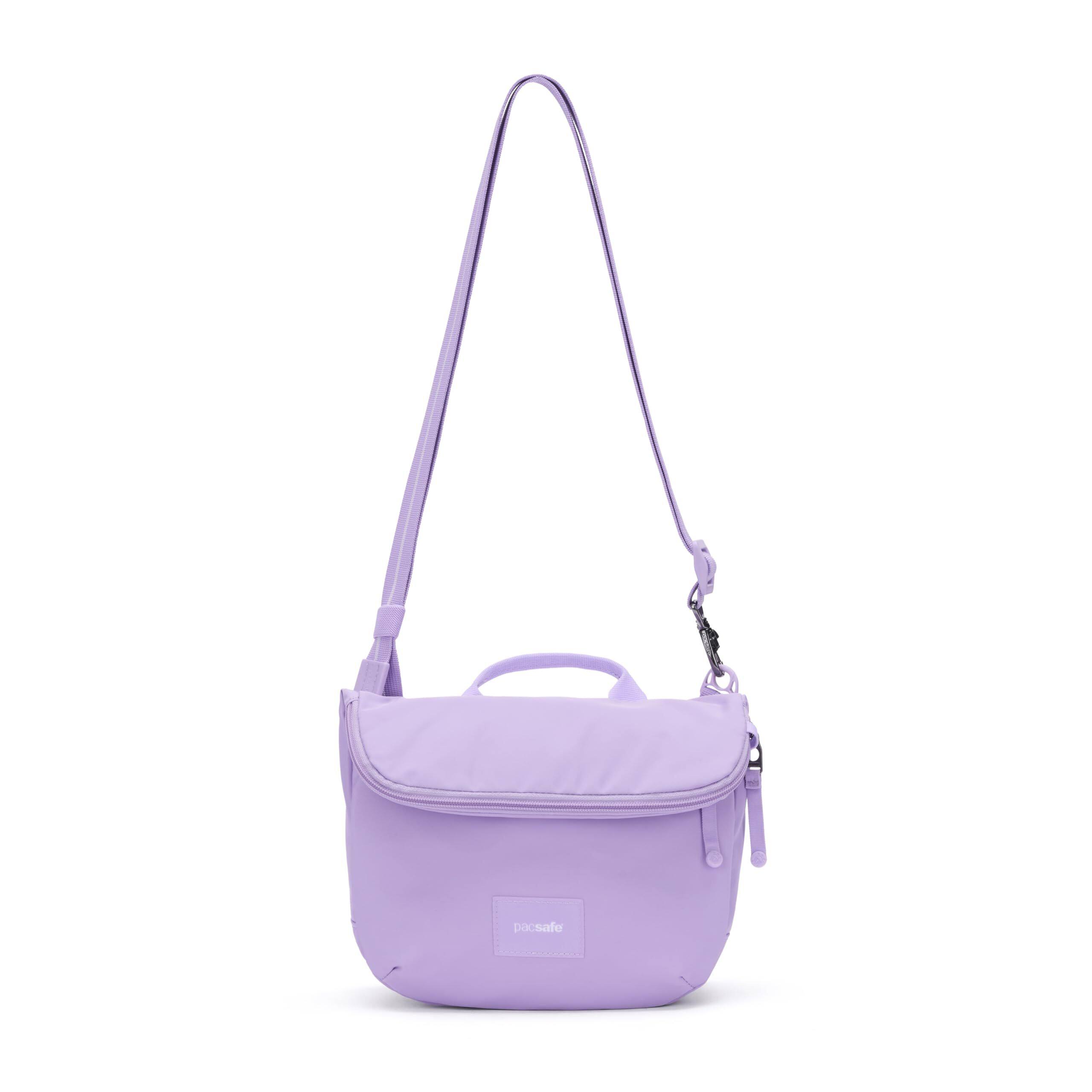 Angle. Pacsafe - GO Saddle Crossbody - Lavender.
